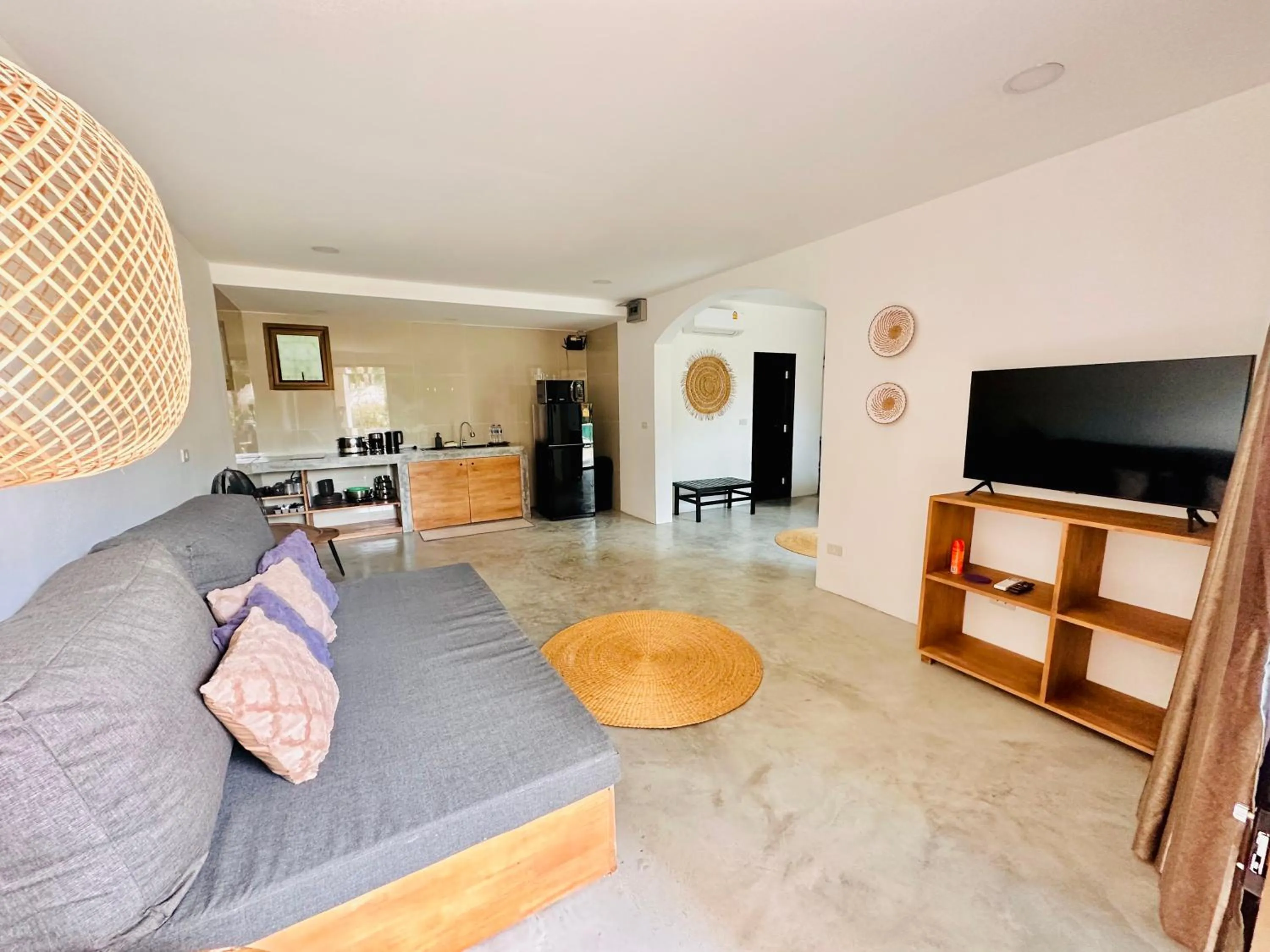 Communal lounge/ TV room in Zibá Home Suites