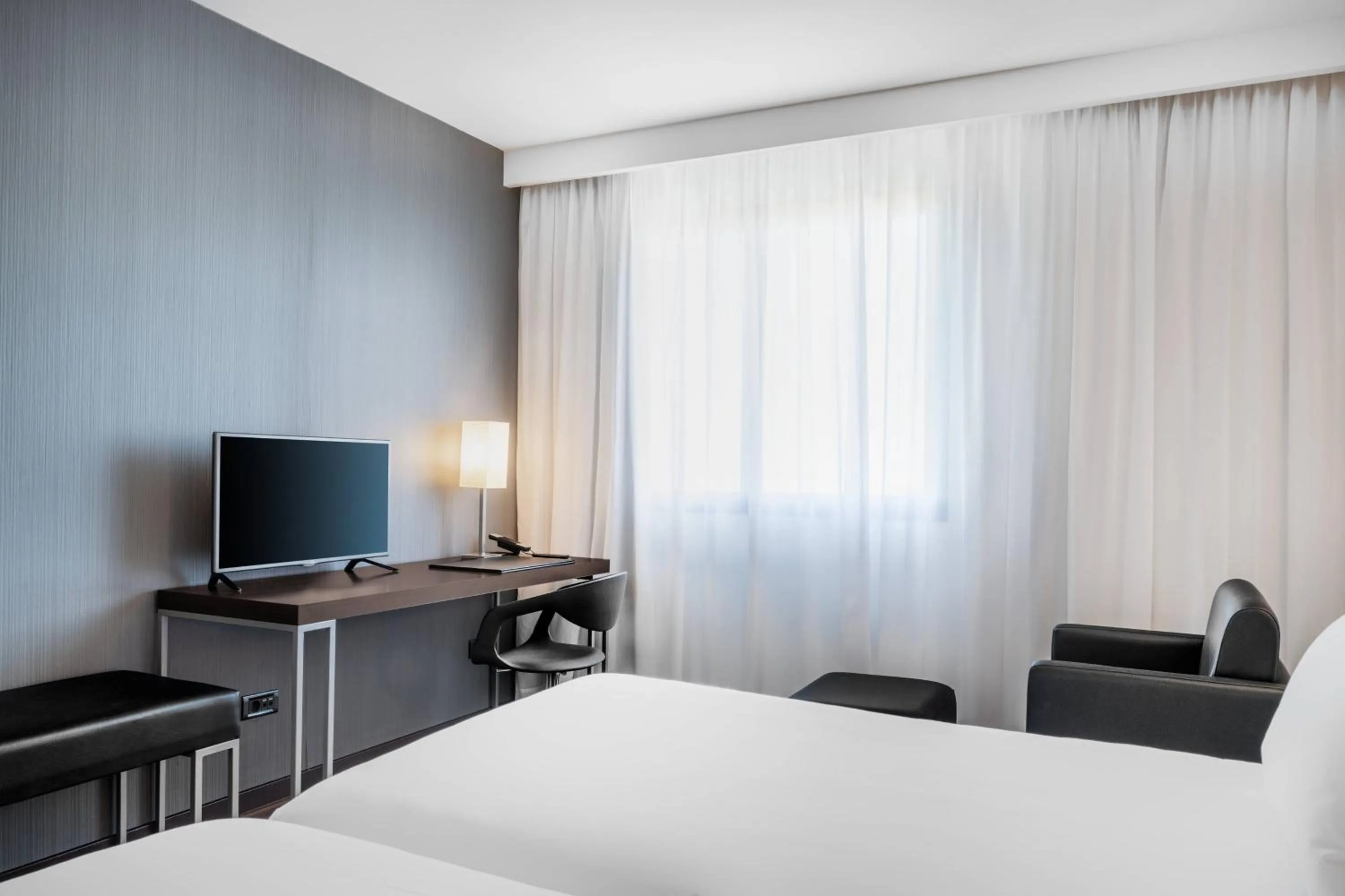 Photo of the whole room, Bed in AC Hotel Algeciras by Marriott