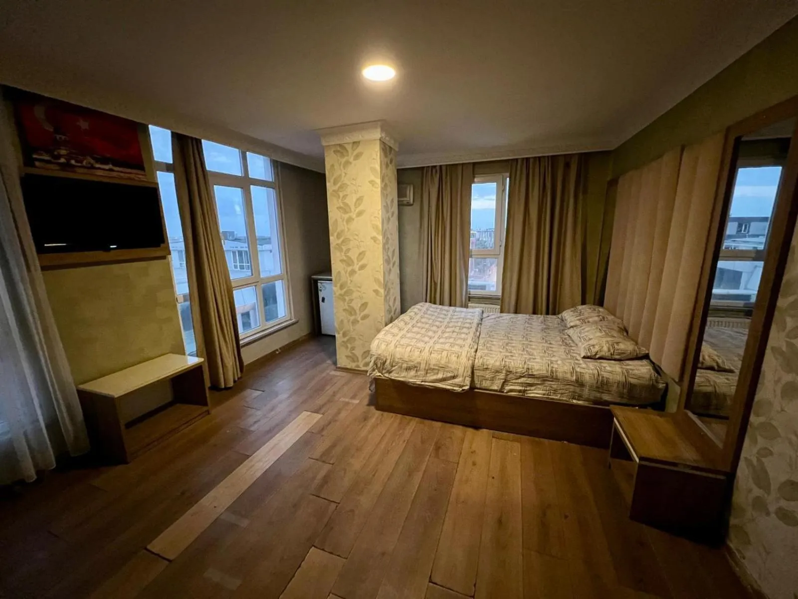 Bed in CAMELLİA SUİT HOTEL