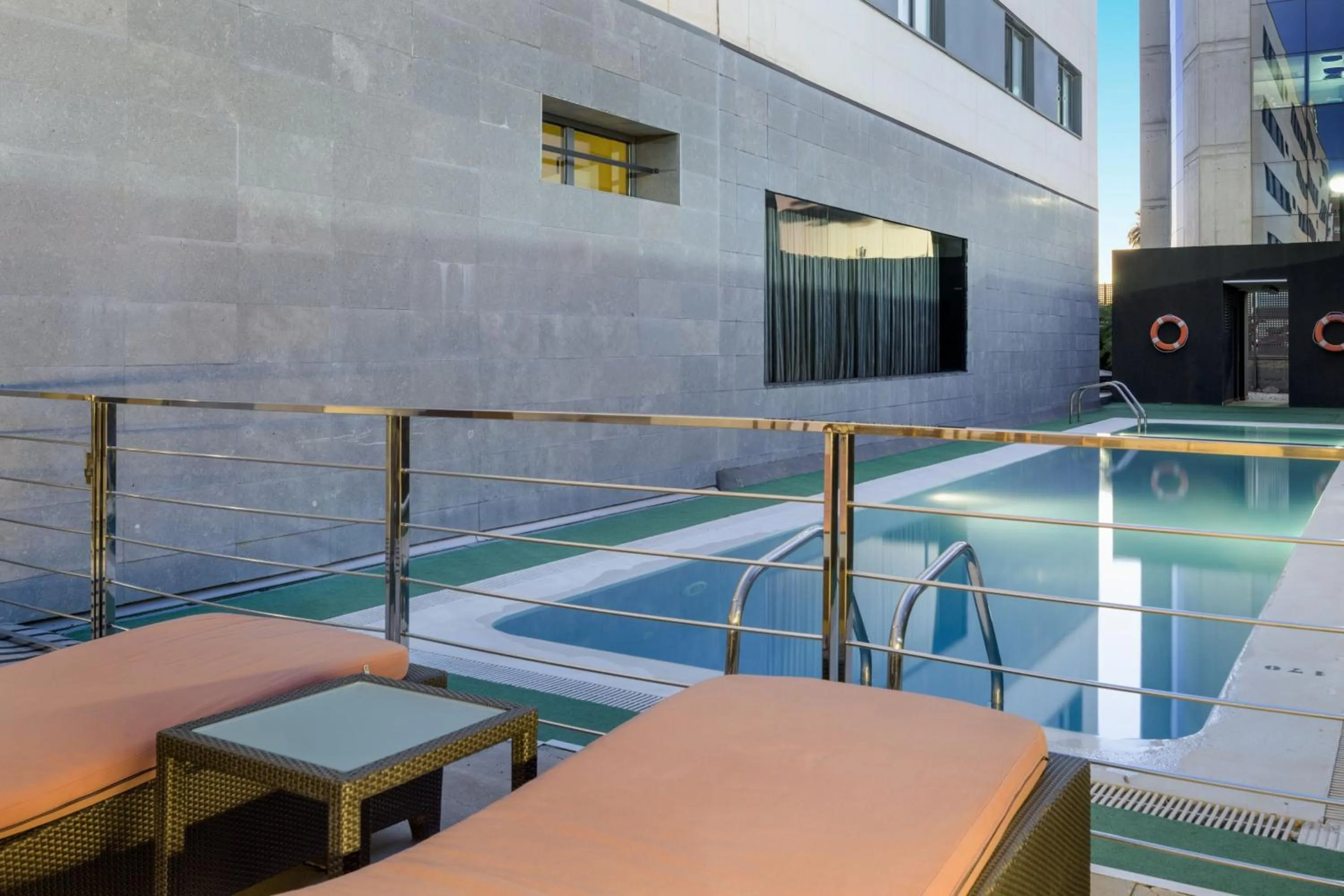 Swimming pool in AC Hotel Murcia by Marriott