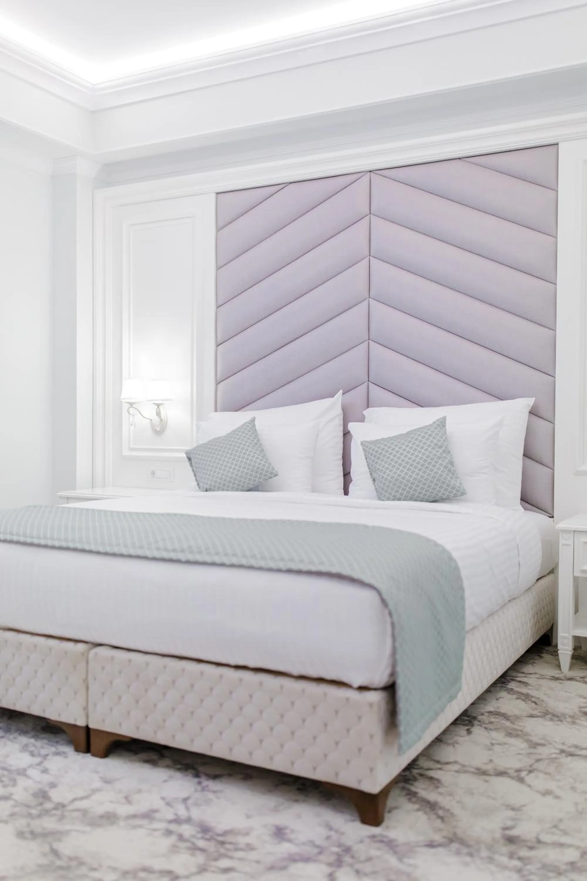 Bed in Muller Hotel Boutique & Spa