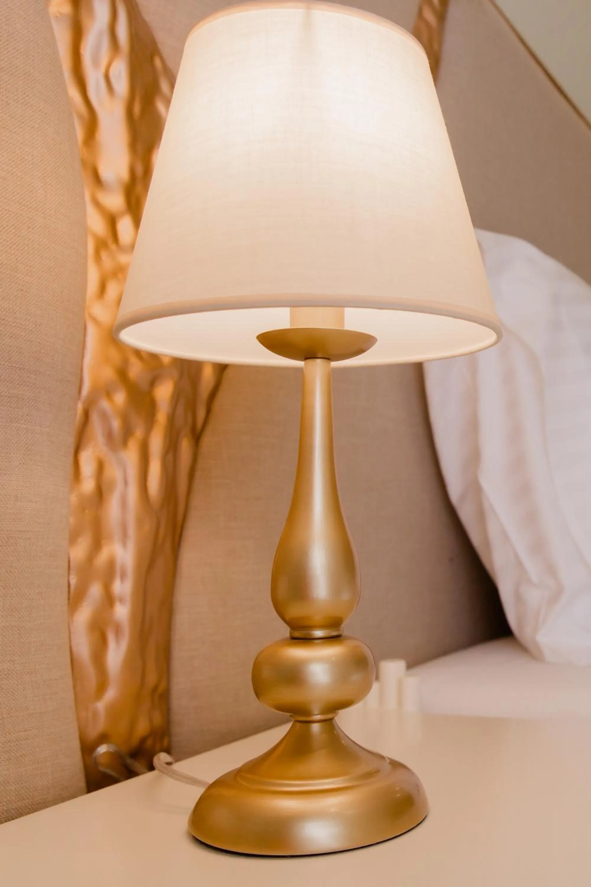 Bed in Muller Hotel Boutique & Spa