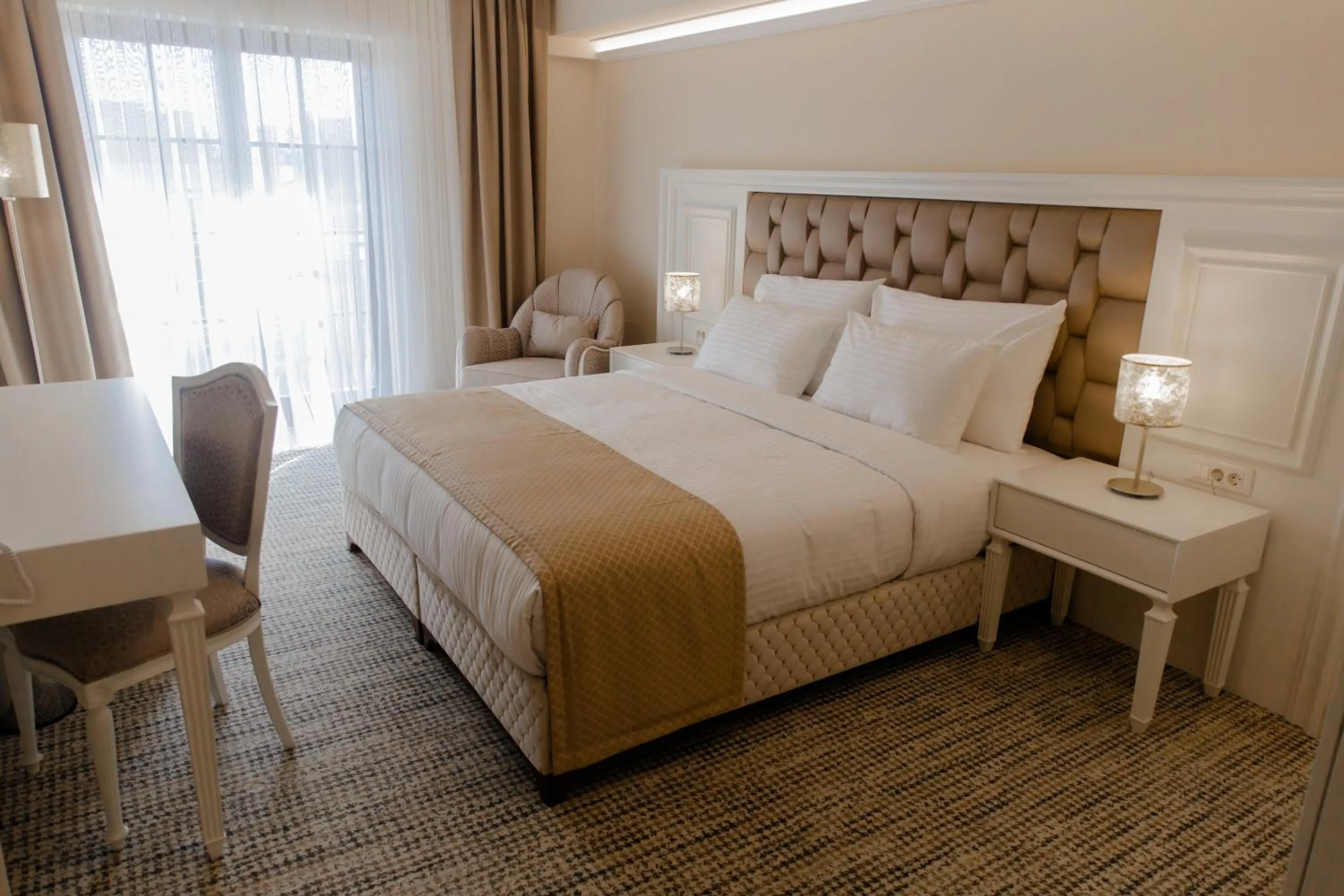 Bed in Muller Hotel Boutique & Spa