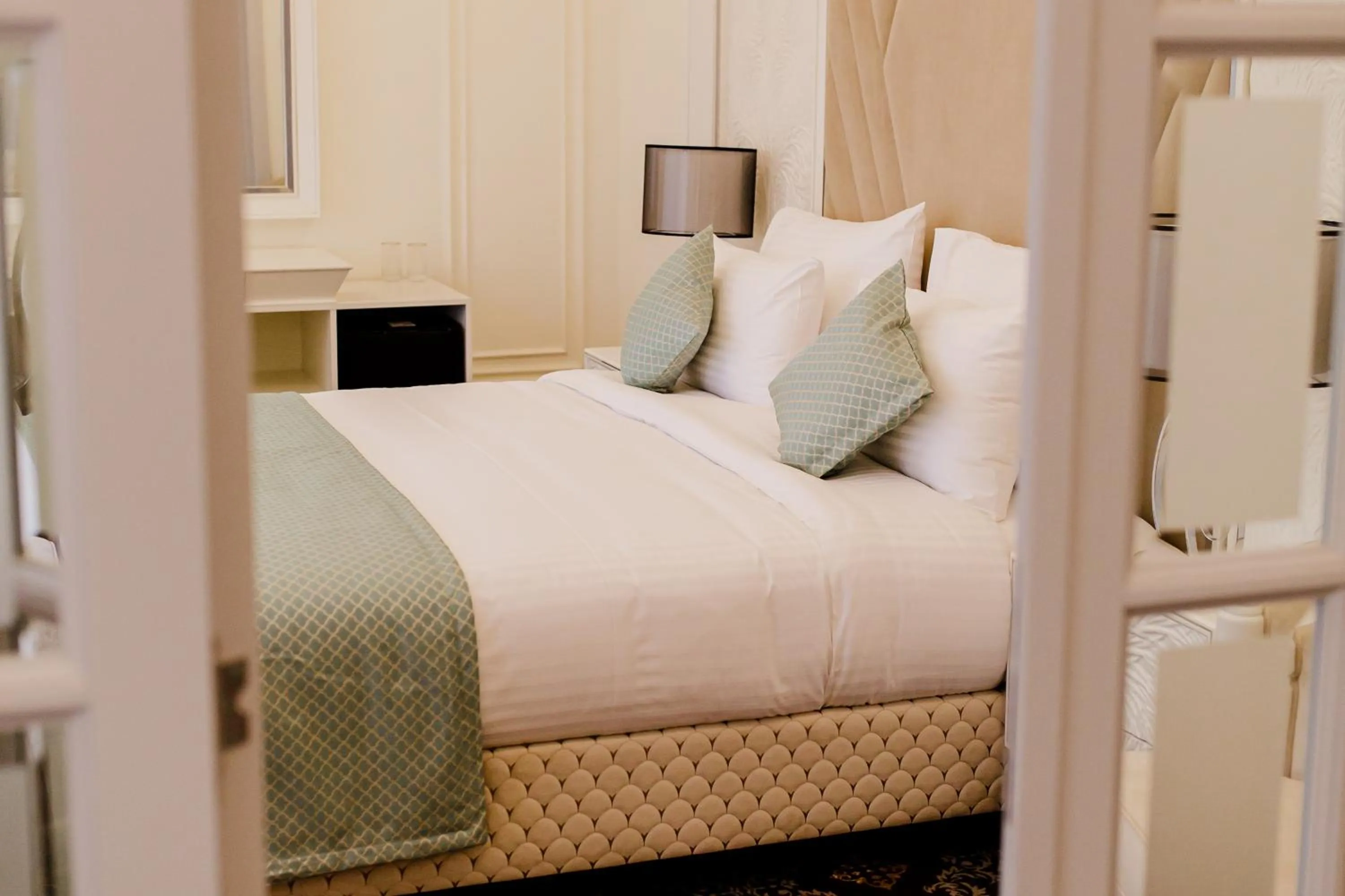 Bed in Muller Hotel Boutique & Spa