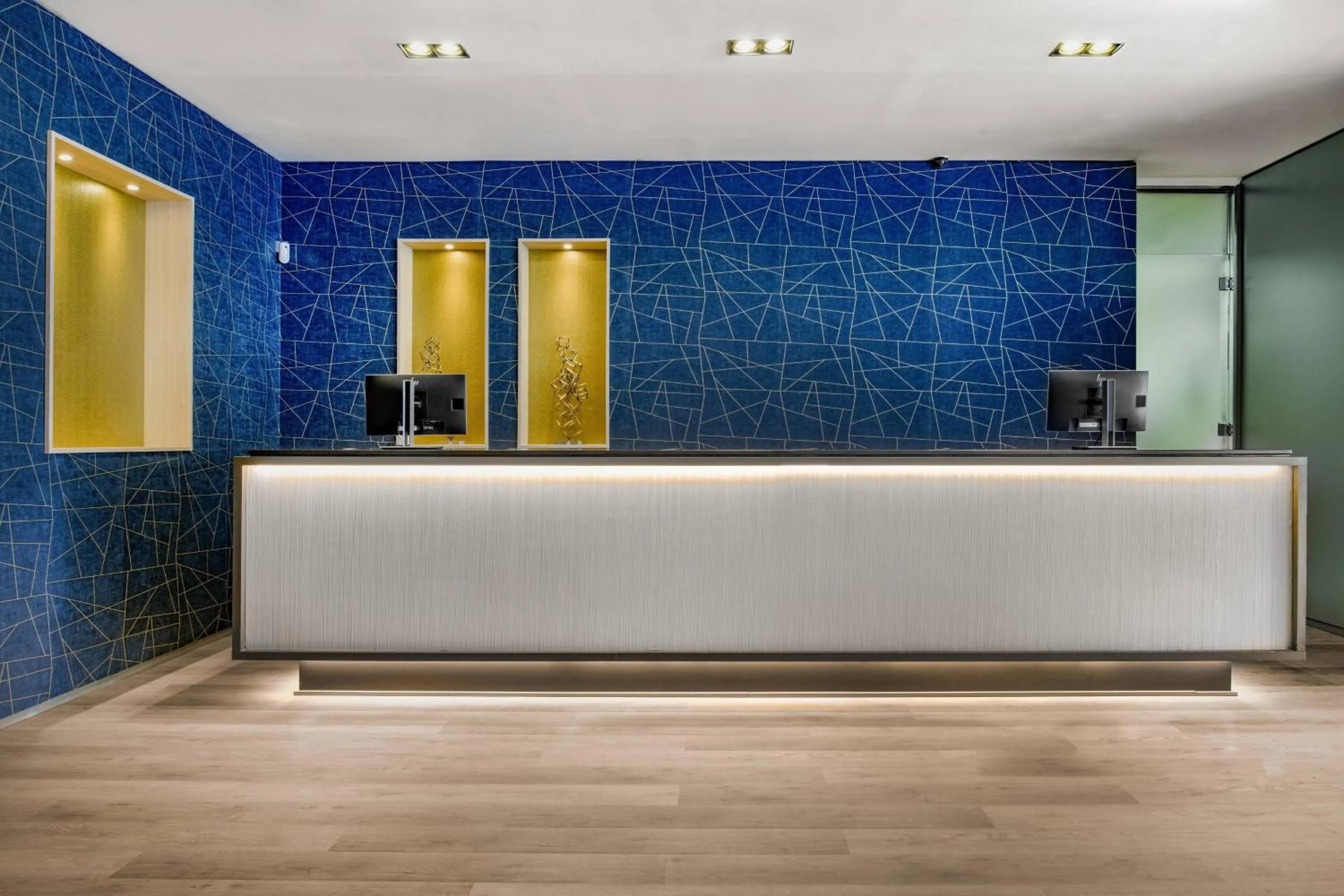 Lobby or reception in AC Hotel Tarragona by Marriott