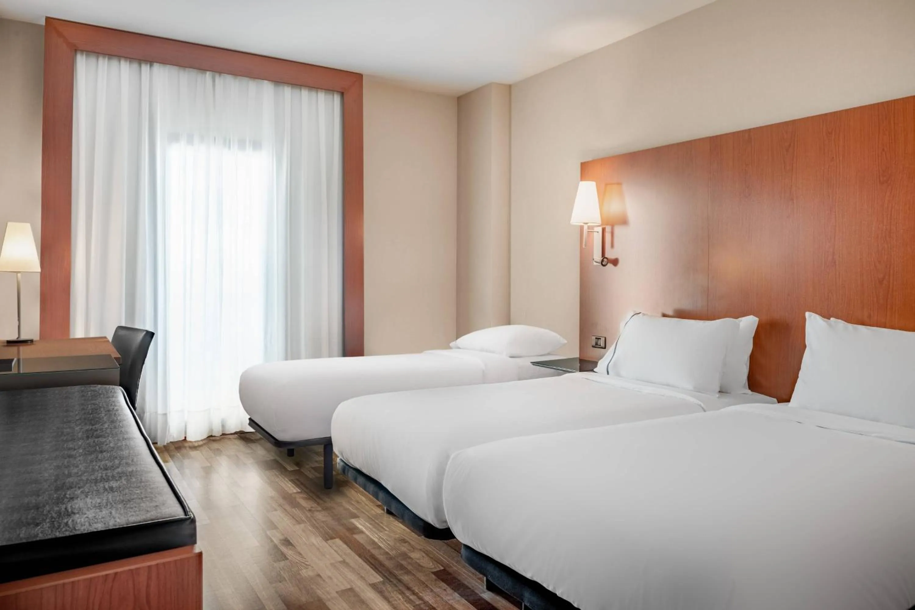 Photo of the whole room, Bed in AC Hotel Badajoz by Marriott