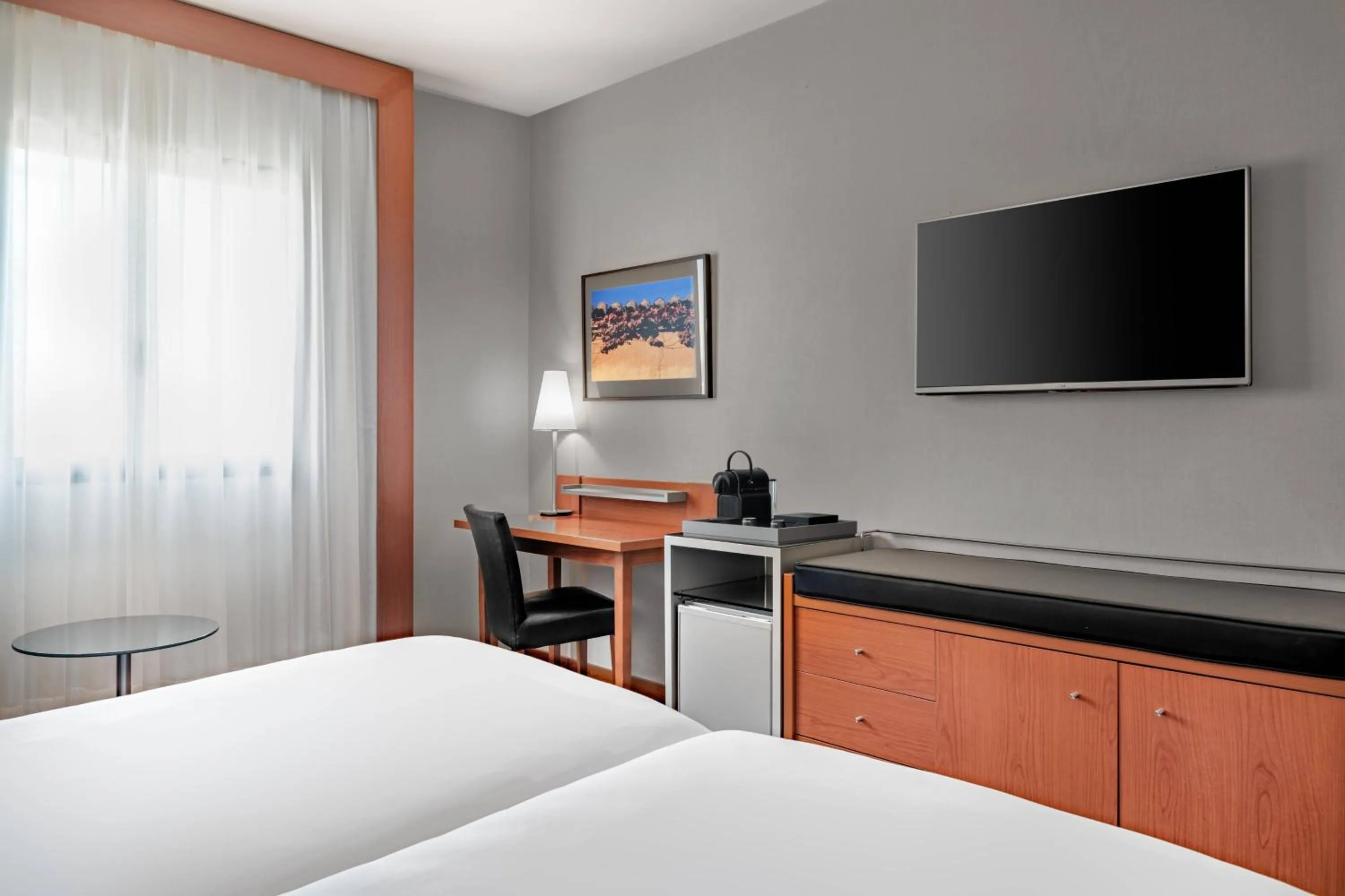 Photo of the whole room, Bed in AC Hotel Badajoz by Marriott