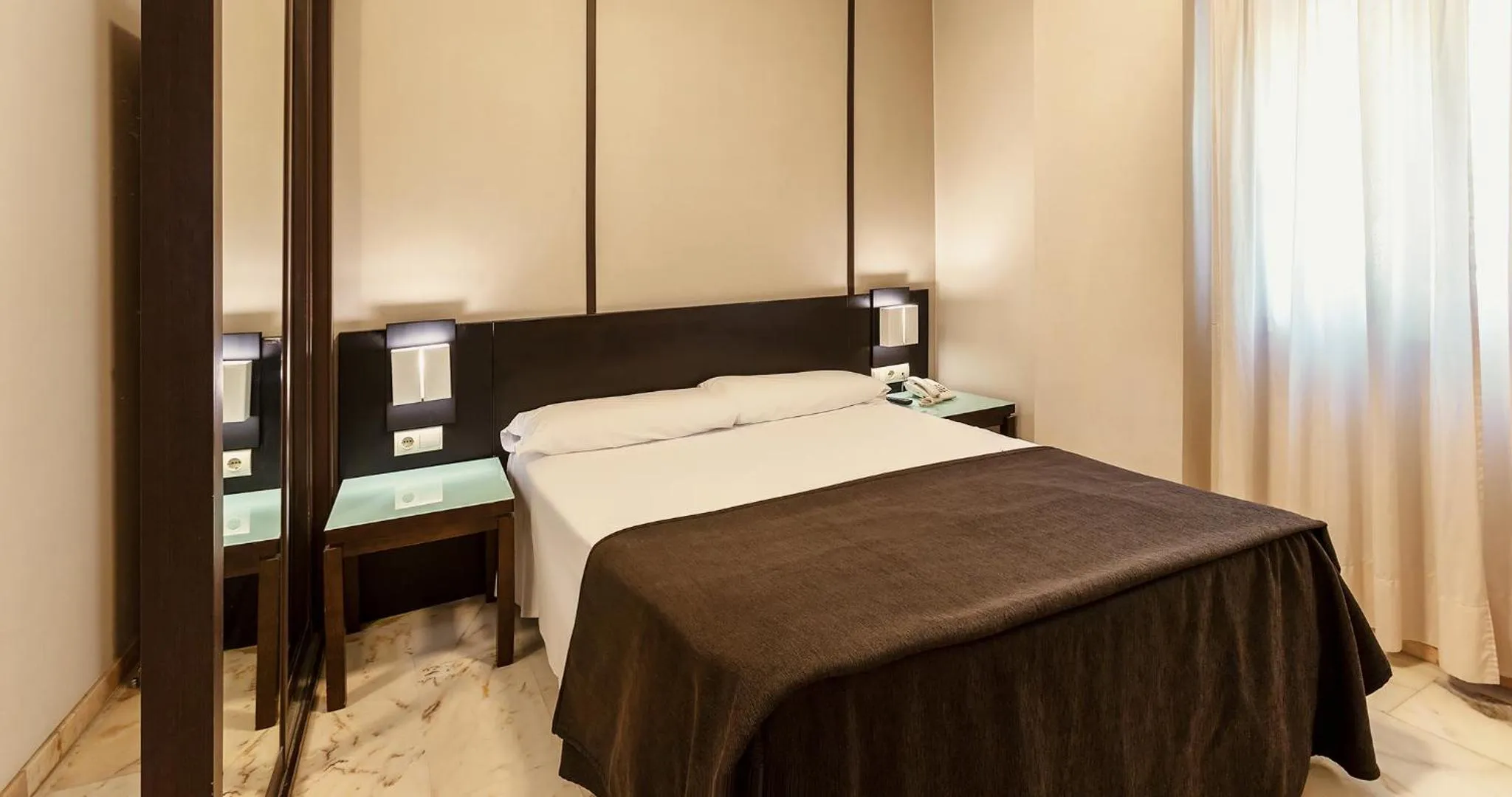 Bedroom, Bed in Apartamentos Vértice Bib Rambla