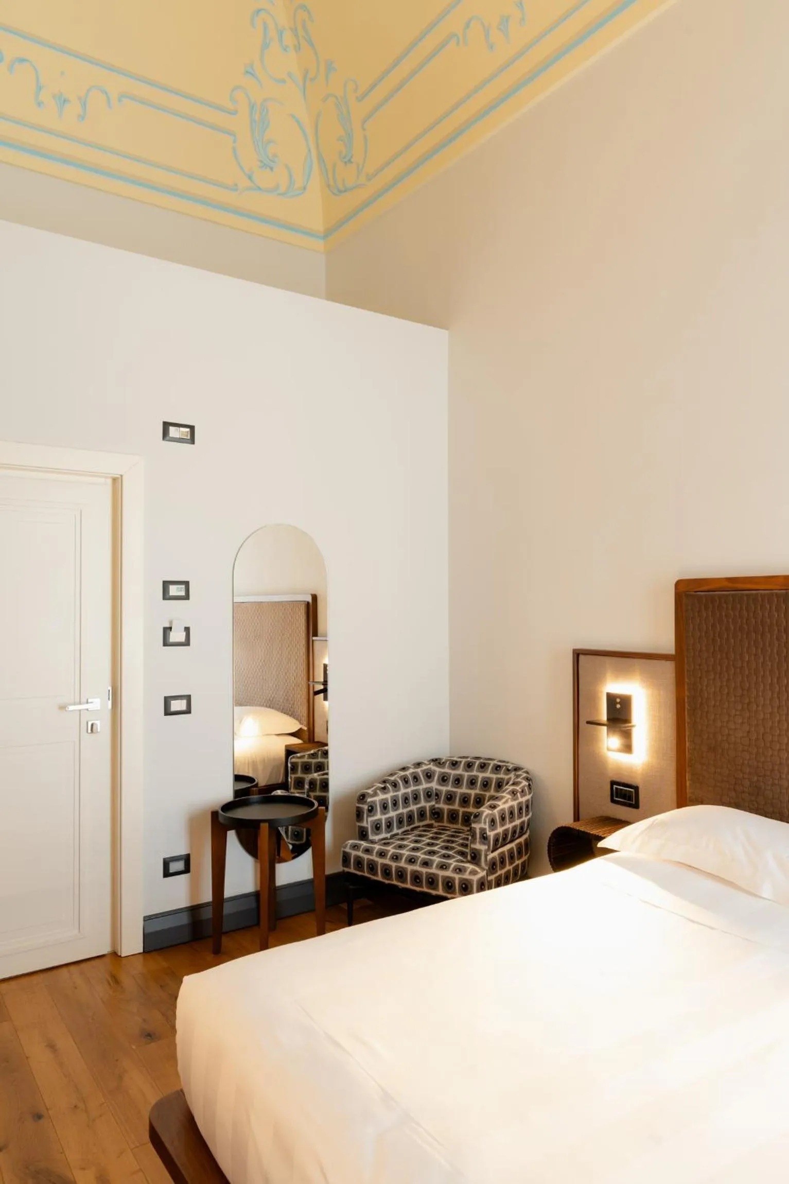 Bed in Lo Stemma Luxury Boutique Hotel