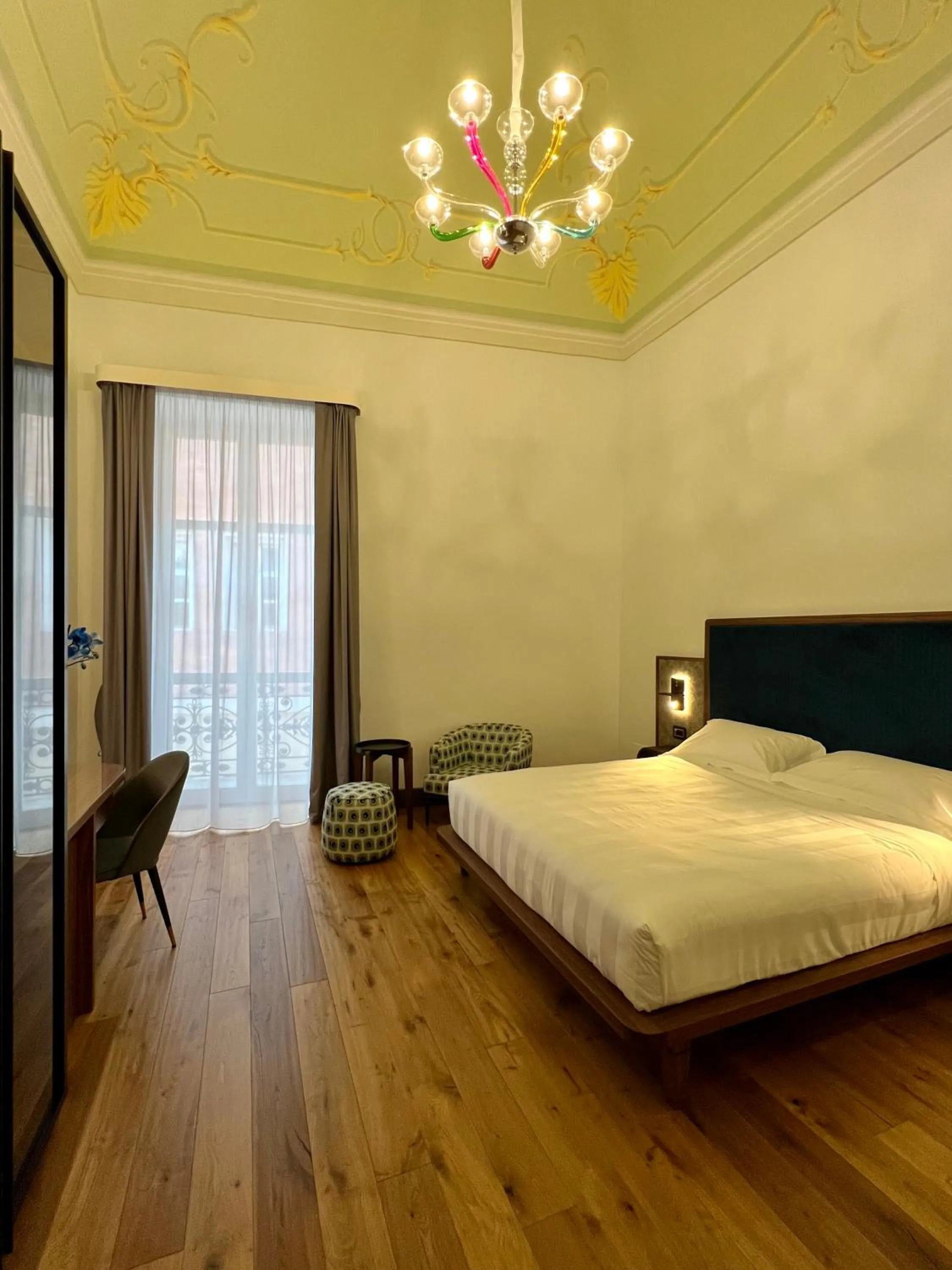 Bed in Lo Stemma Luxury Boutique Hotel