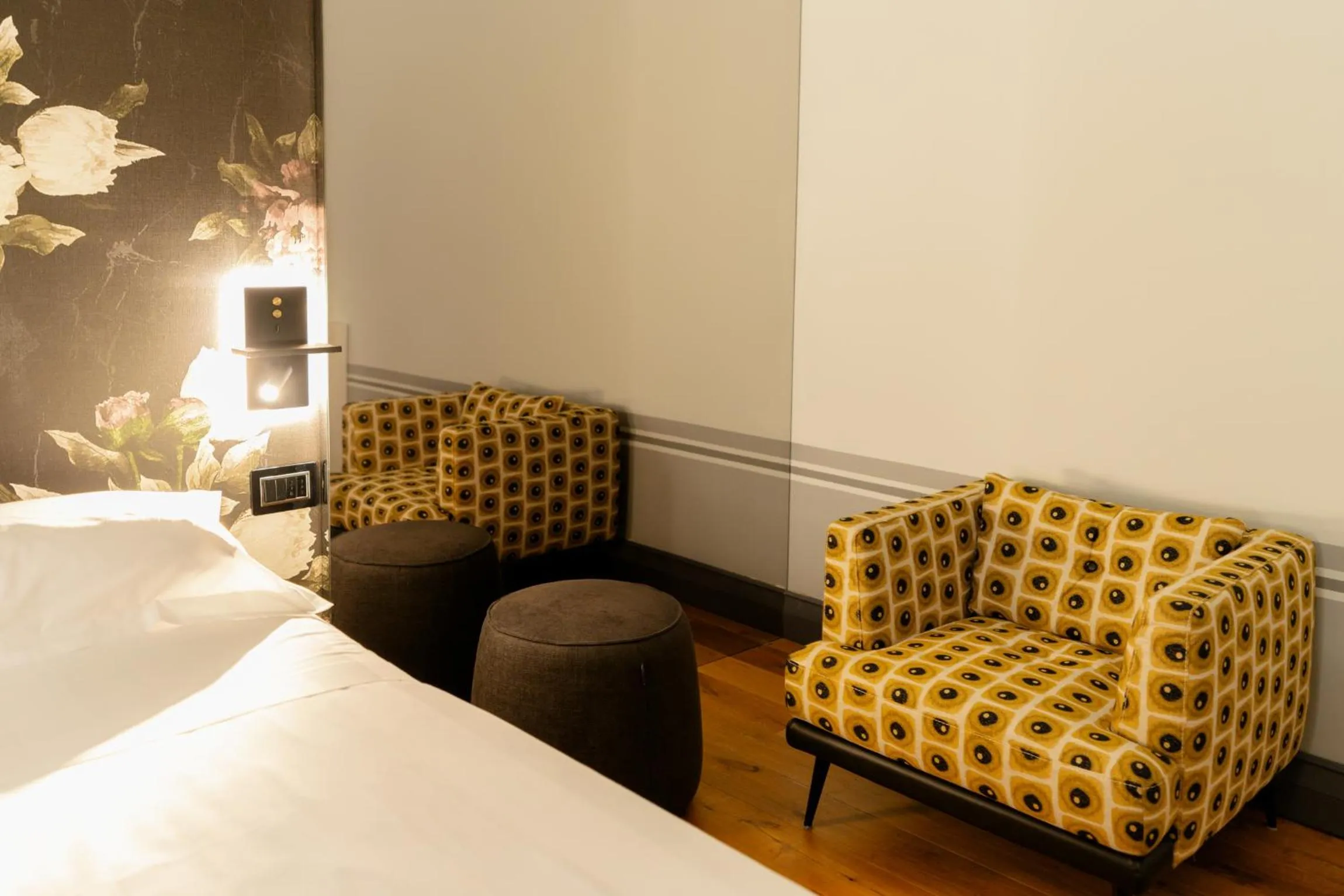 Bed in Lo Stemma Luxury Boutique Hotel