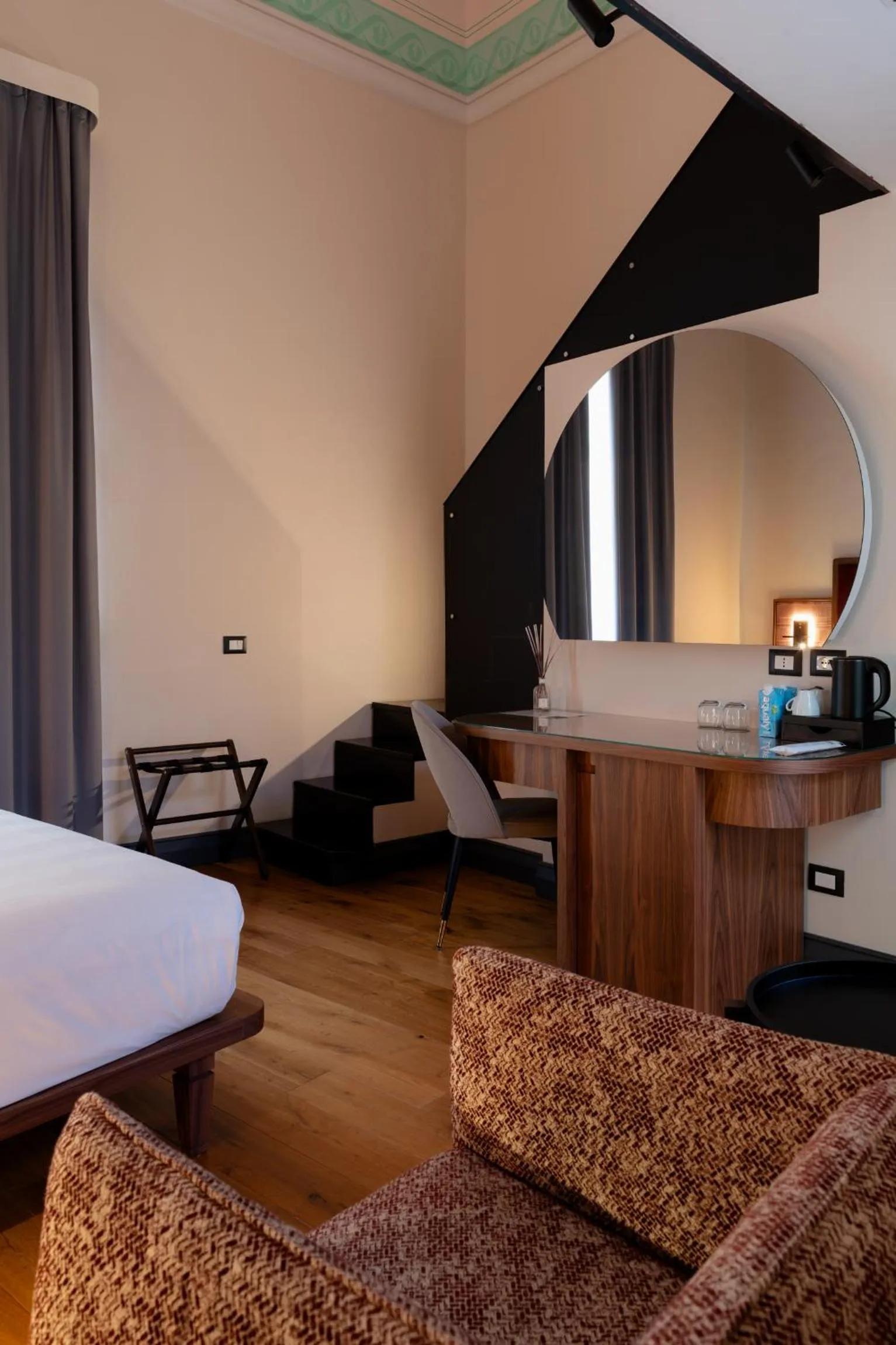 Bed in Lo Stemma Luxury Boutique Hotel