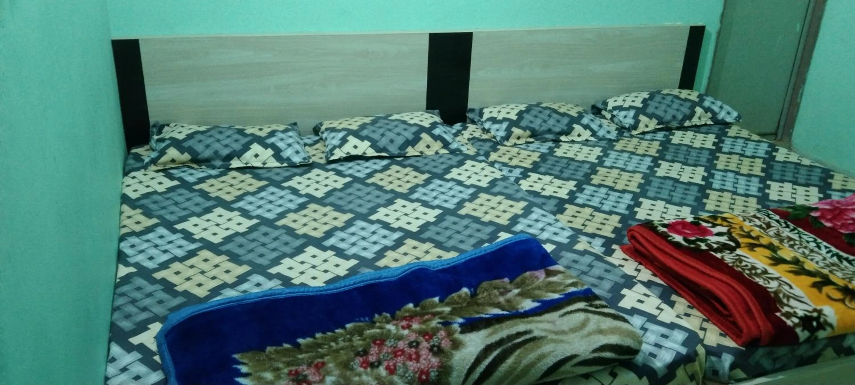 Bed in NEW MILAN PALACE, Deoghar