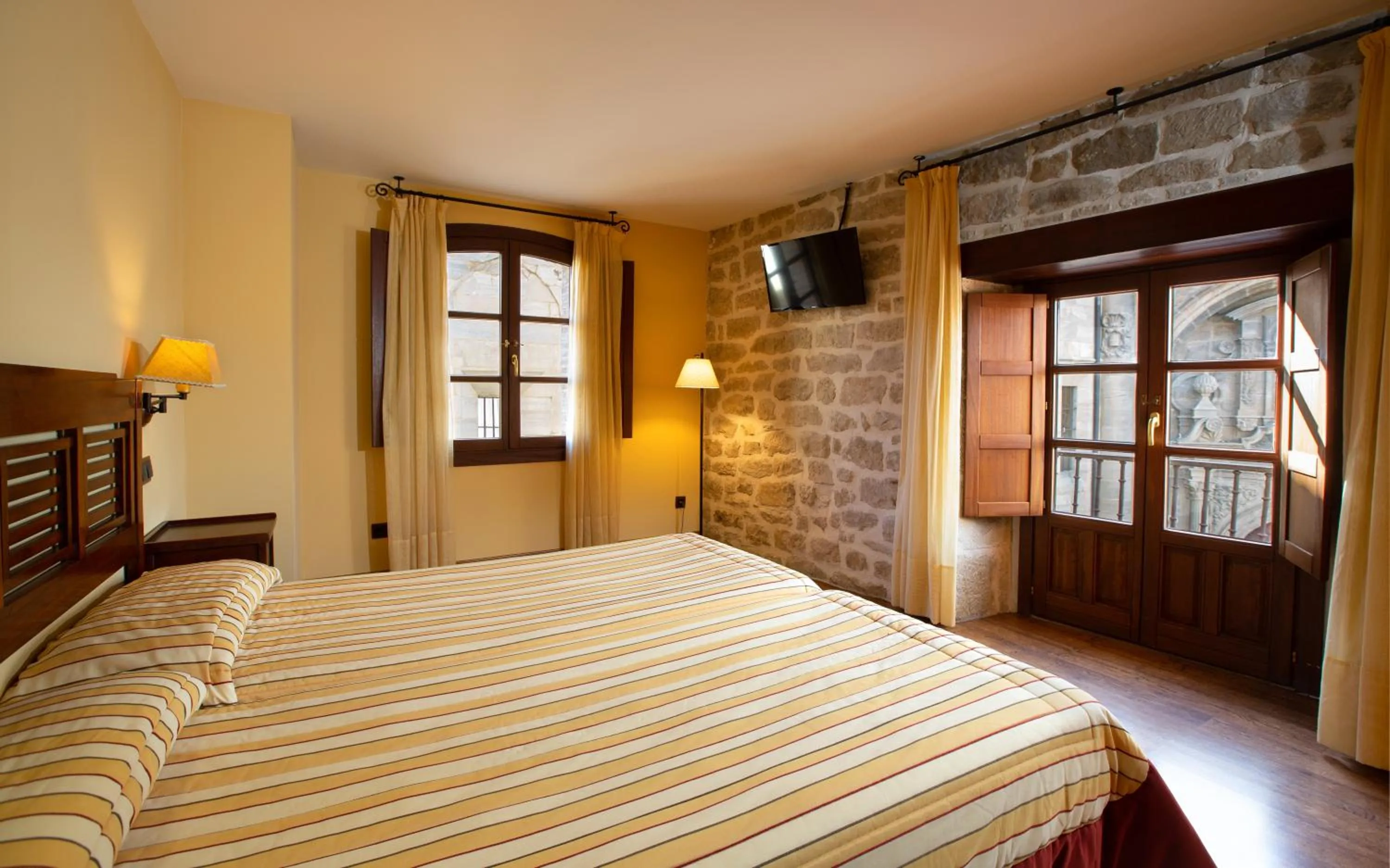 Bed in Hotel Palacio Pujadas by Pandora Hoteles