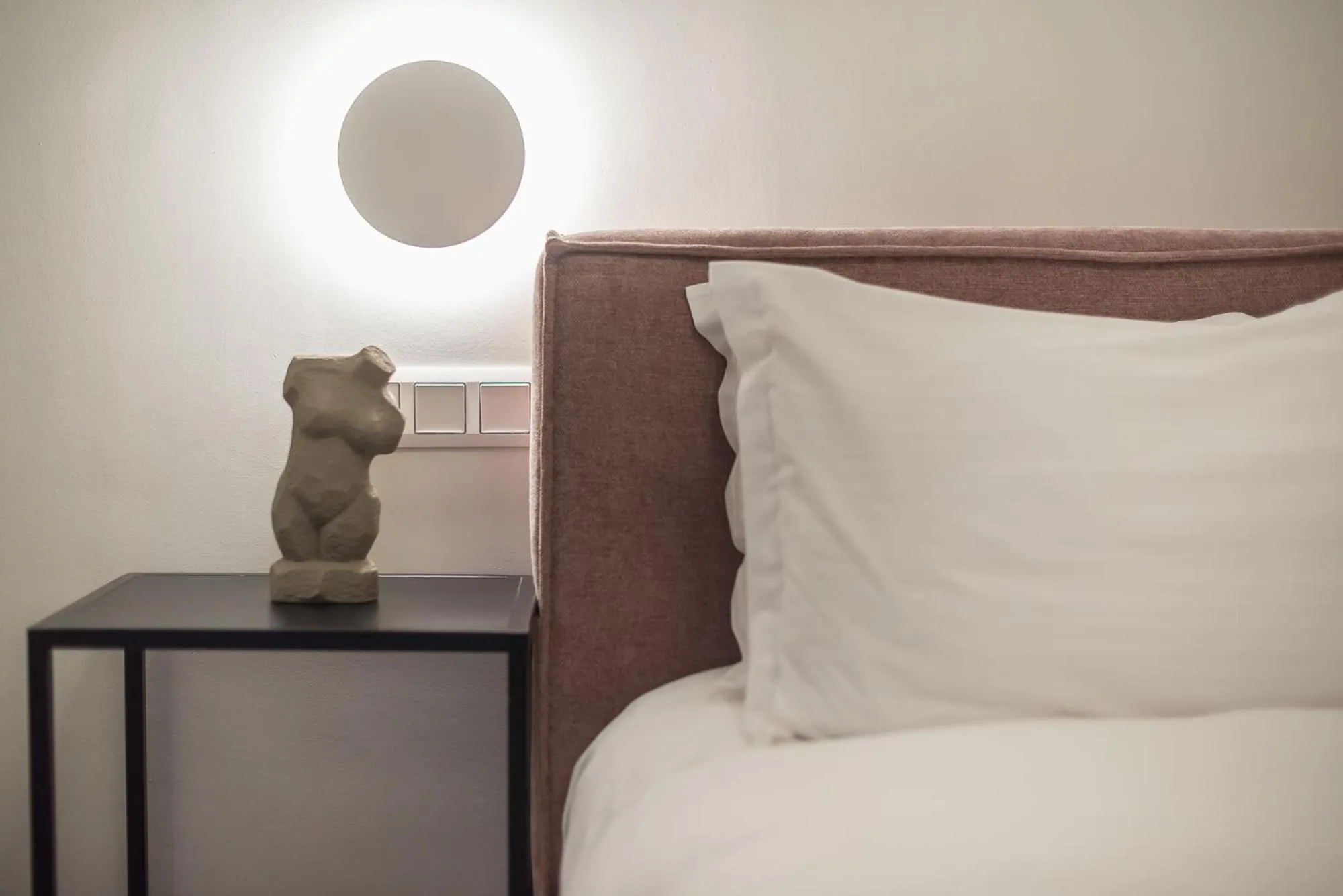 Bed in Aeiphoria Suites & Rooms - Athens