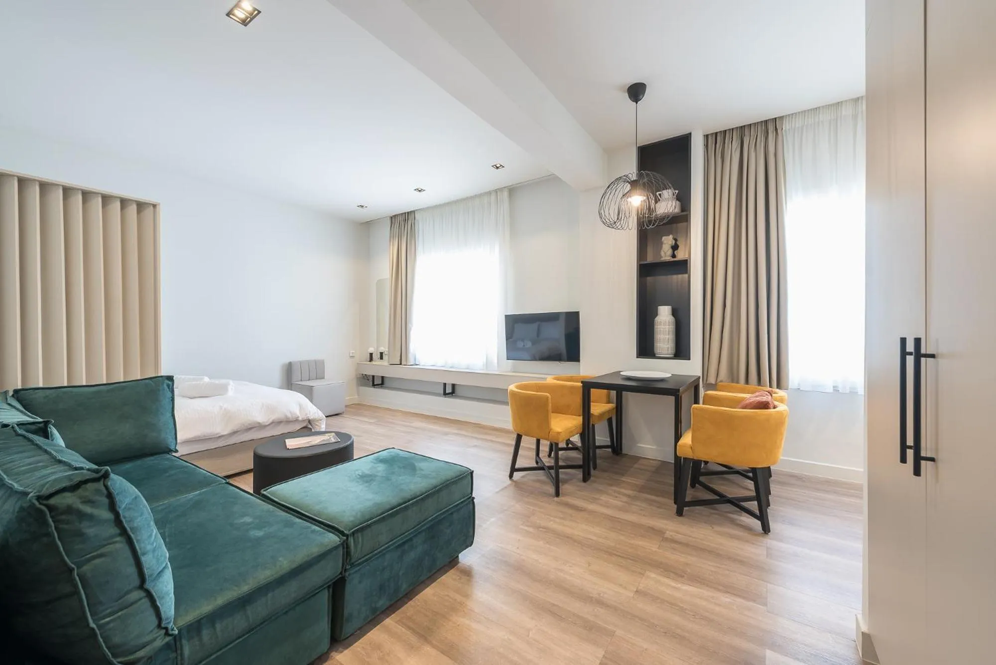 Living room, Bed in Aeiphoria Suites & Rooms - Athens