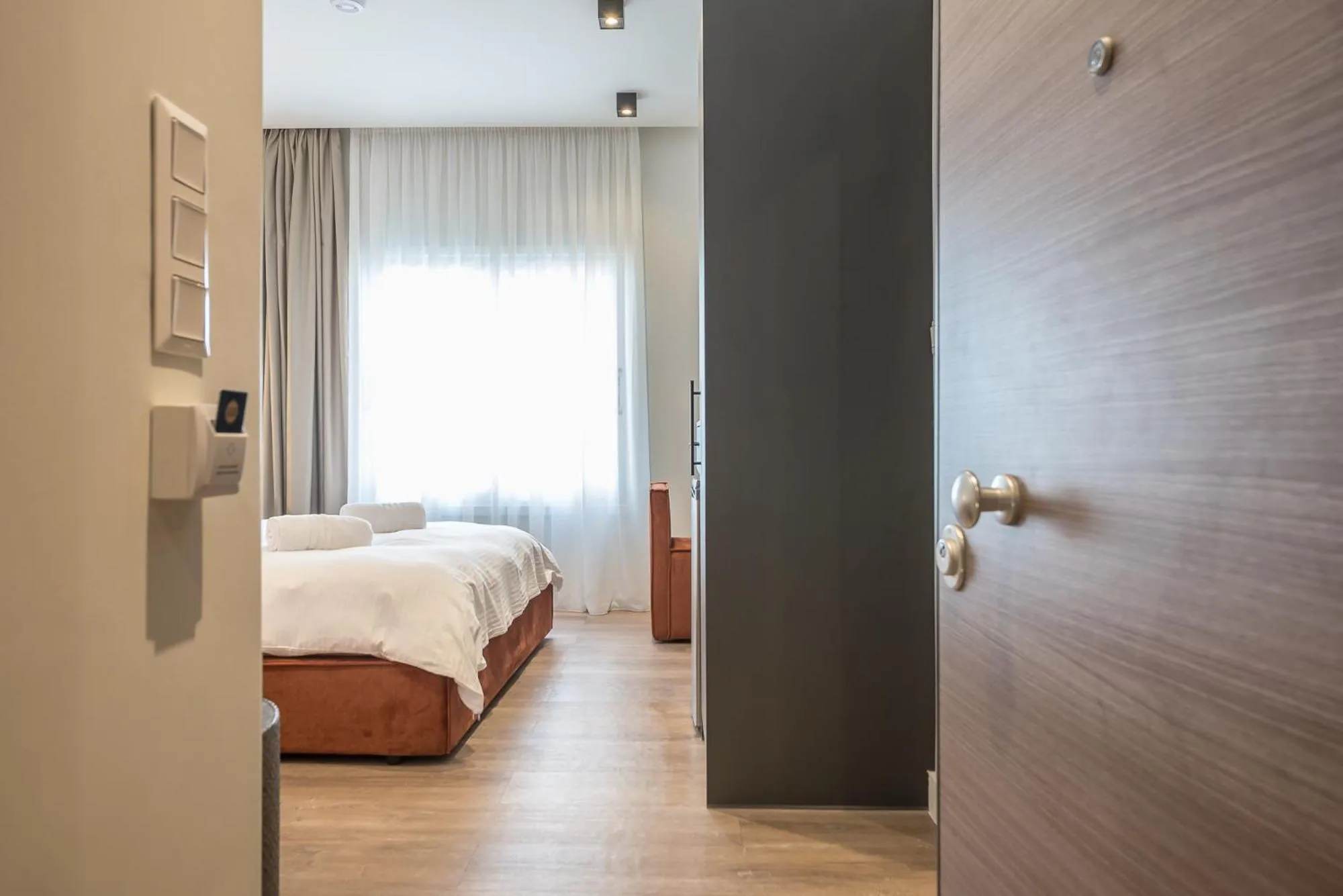 Bed in Aeiphoria Suites & Rooms - Athens