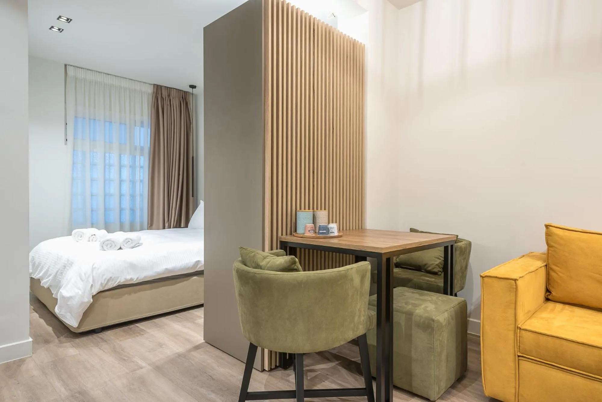 Bed in Aeiphoria Suites & Rooms - Athens