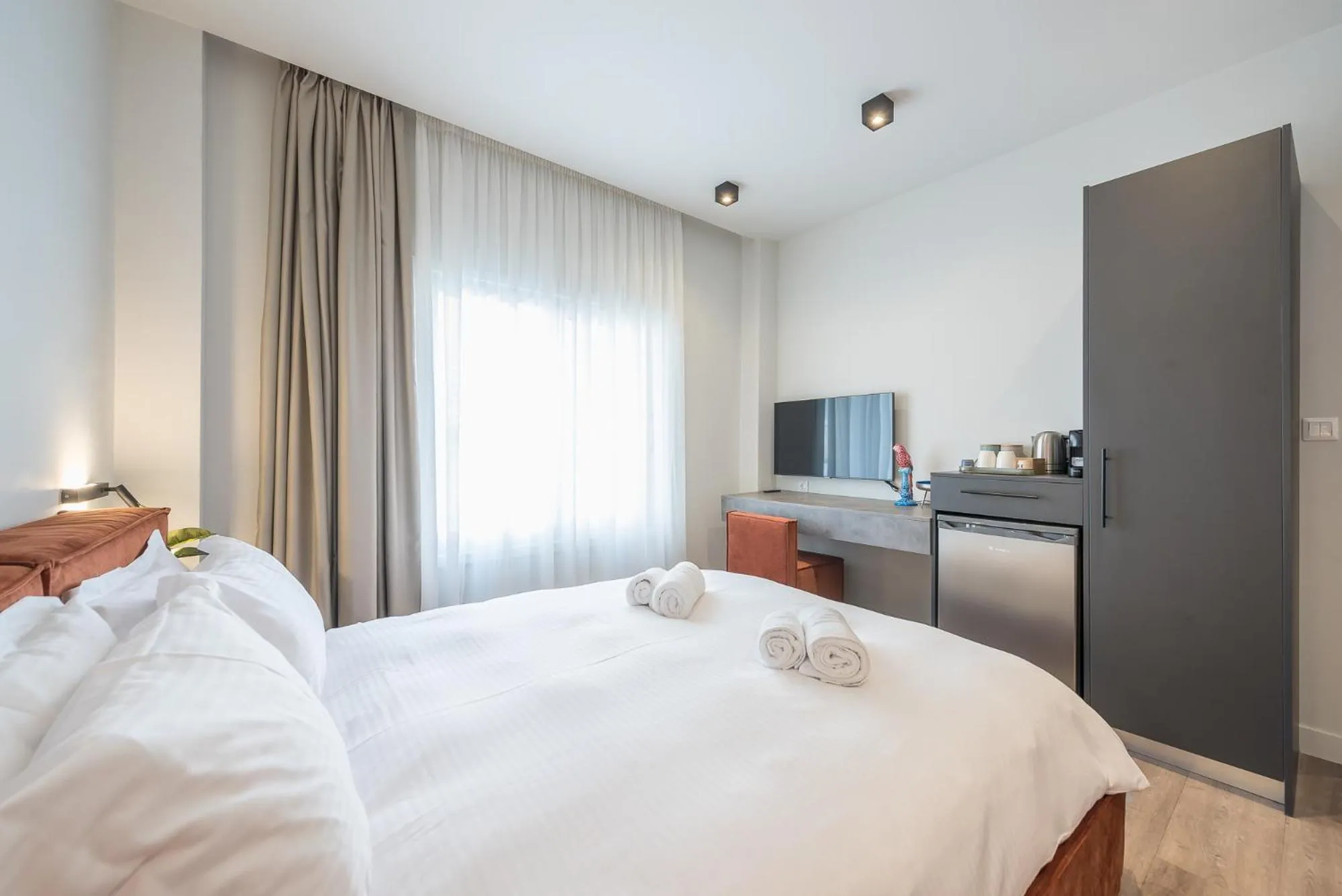 Bed in Aeiphoria Suites & Rooms - Athens