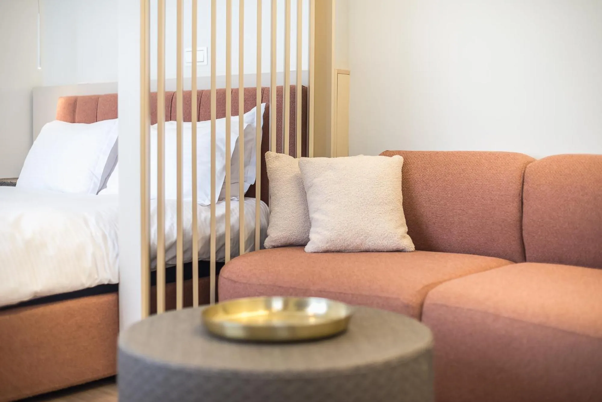 Seating area, Bed in Aeiphoria Suites & Rooms - Athens