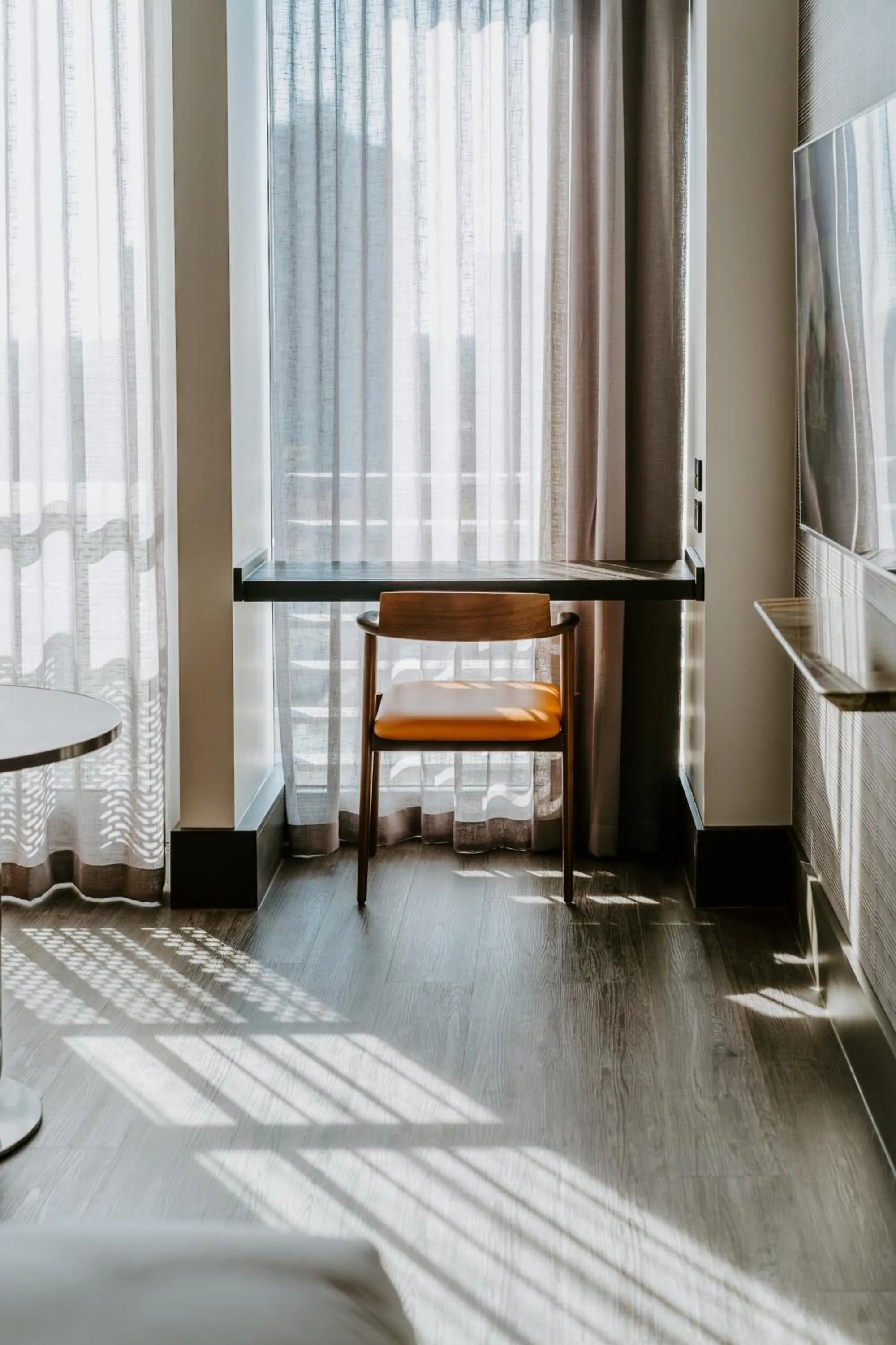 Seating area, Bed in The Motley Hotel Richmond, Tapestry Collection by Hilton