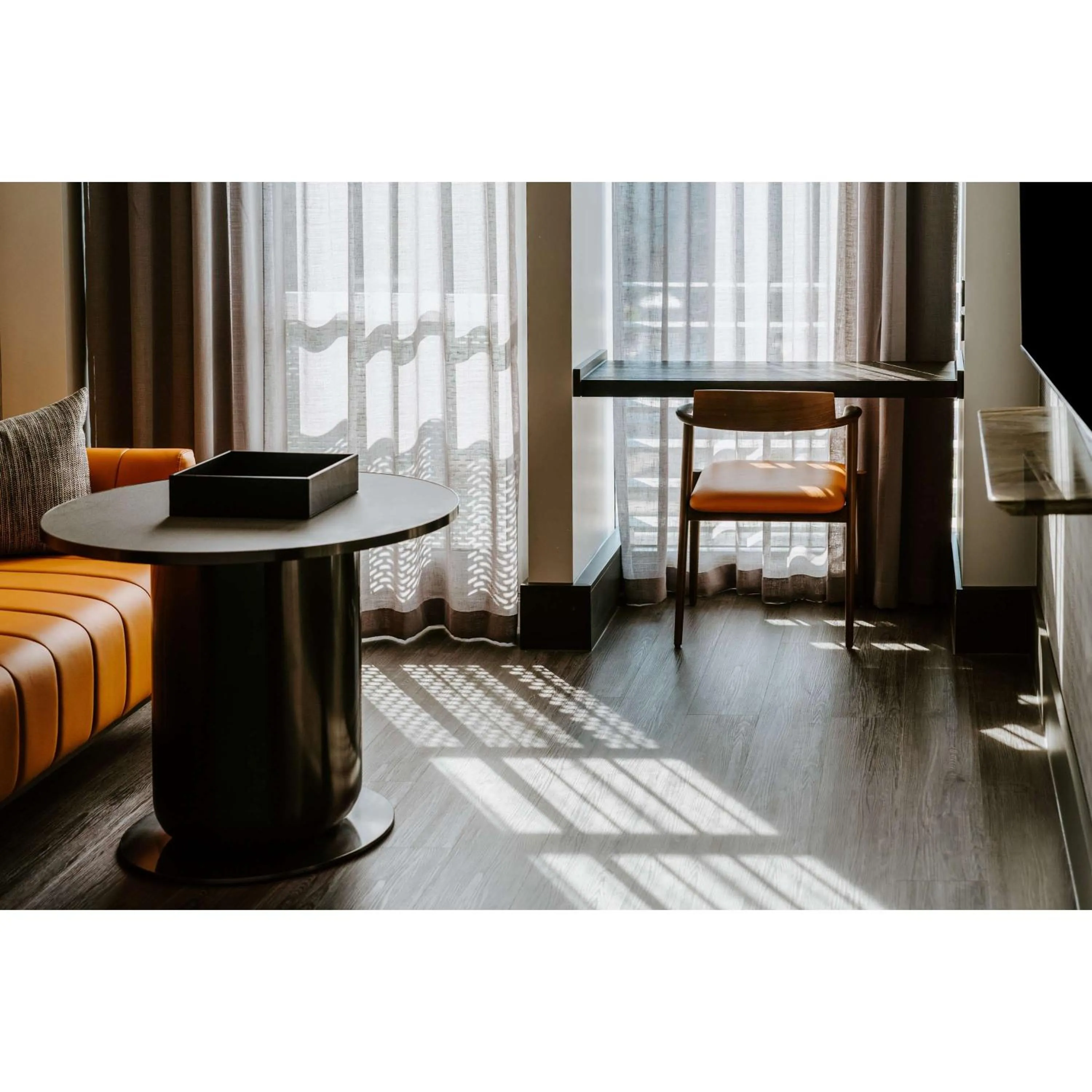 Living room in The Motley Hotel Richmond, Tapestry Collection by Hilton