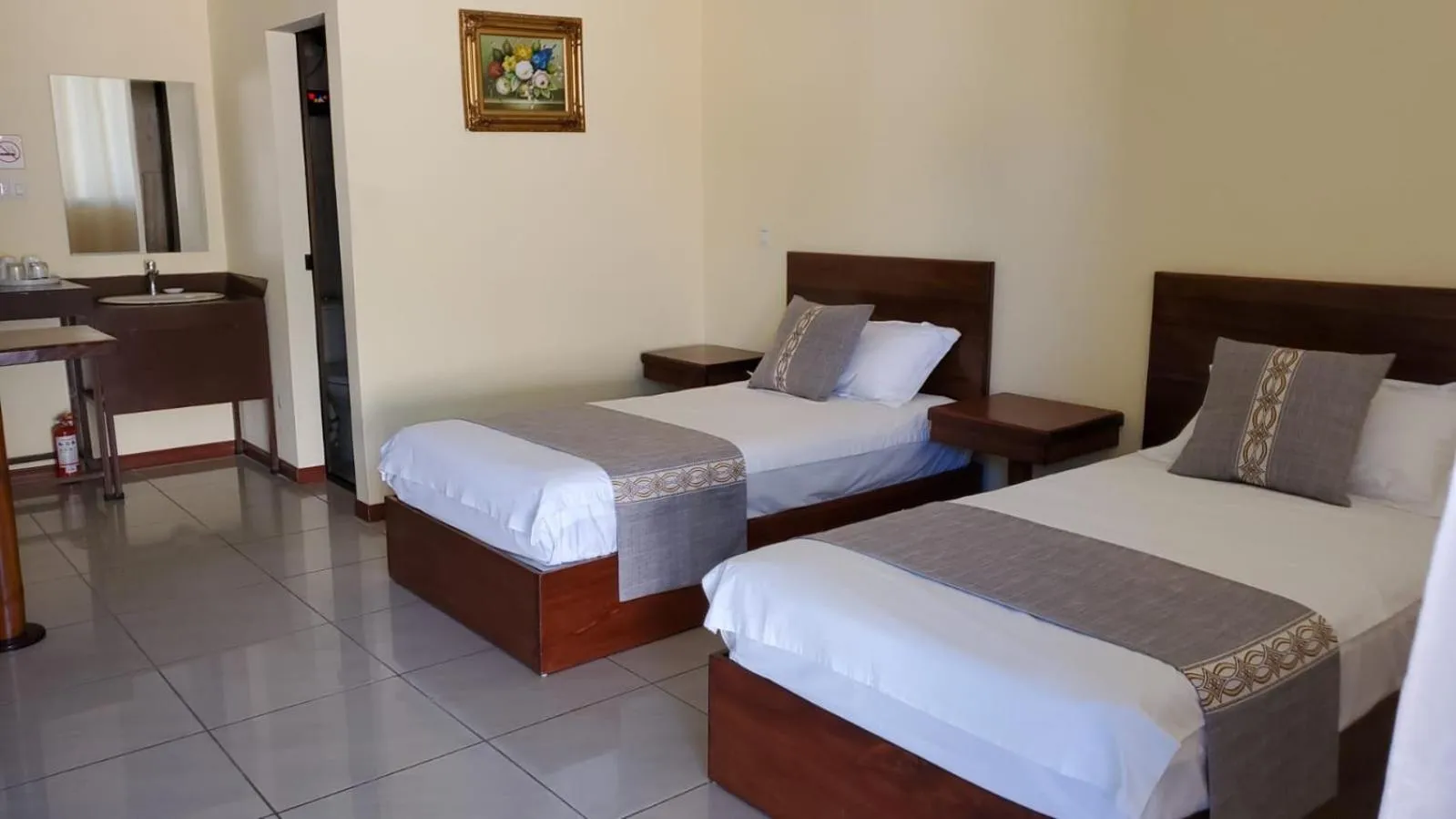 Bed in Villa Garita Inn
