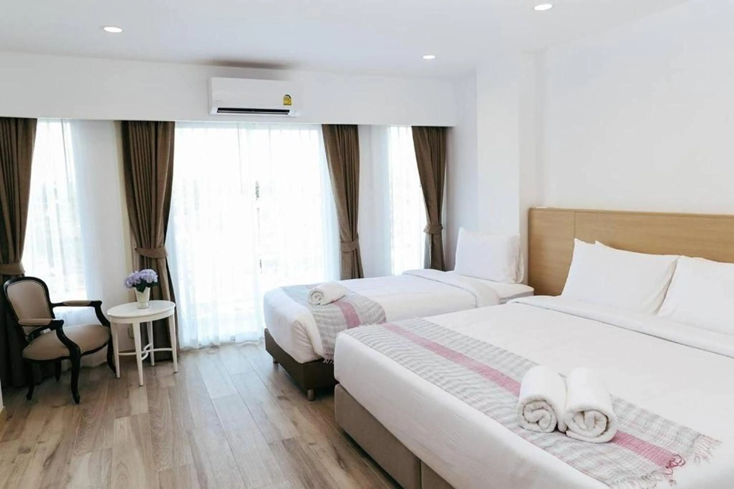 Bed in Arsh Boutique Hotel