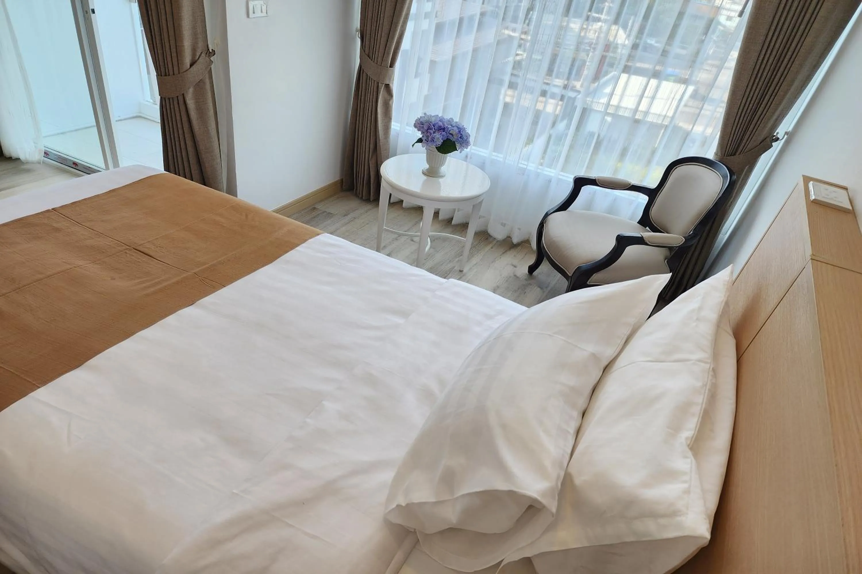 Bed in Arsh Boutique Hotel