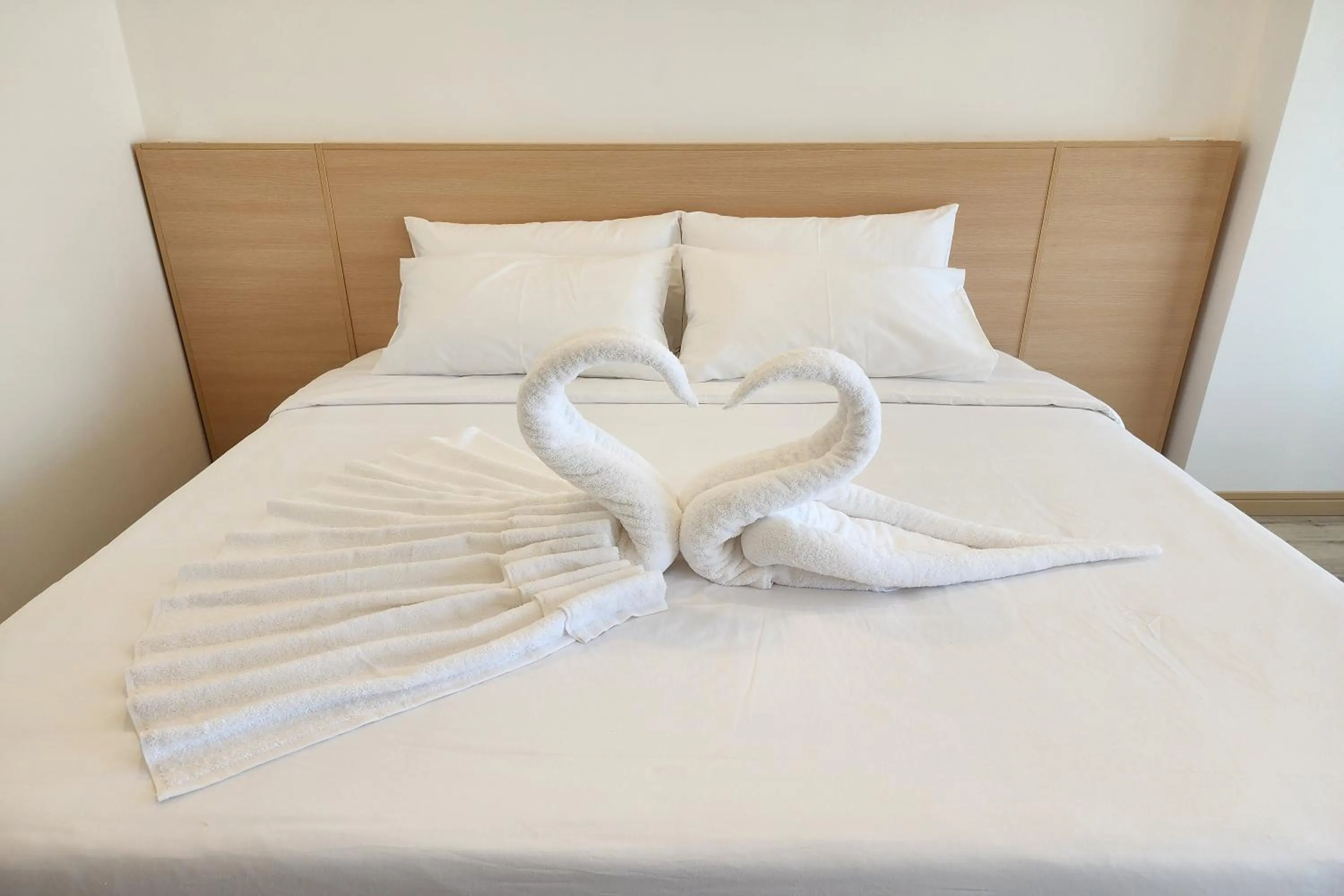 Bed in Arsh Boutique Hotel