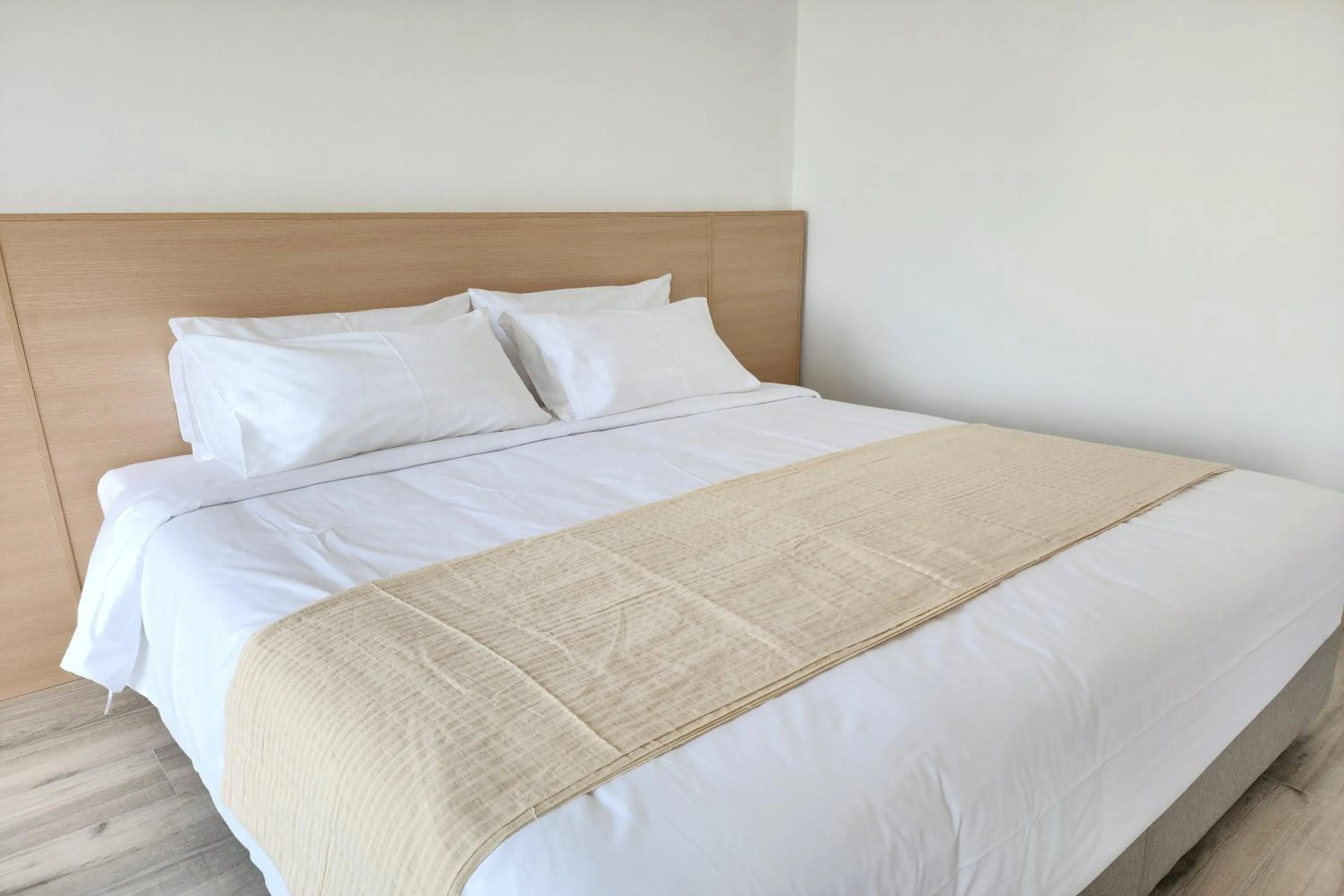 Bed in Arsh Boutique Hotel