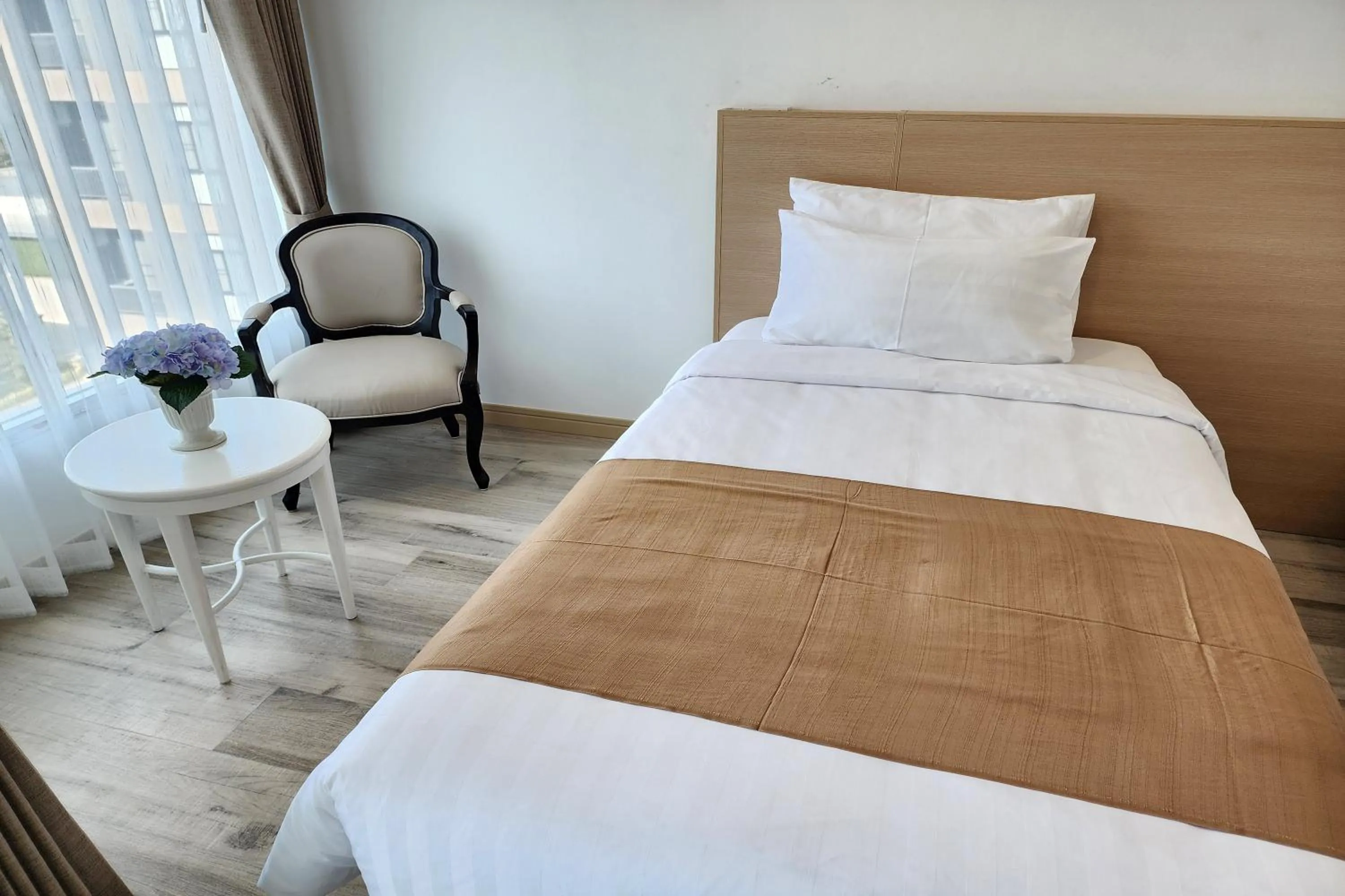 Bed in Arsh Boutique Hotel