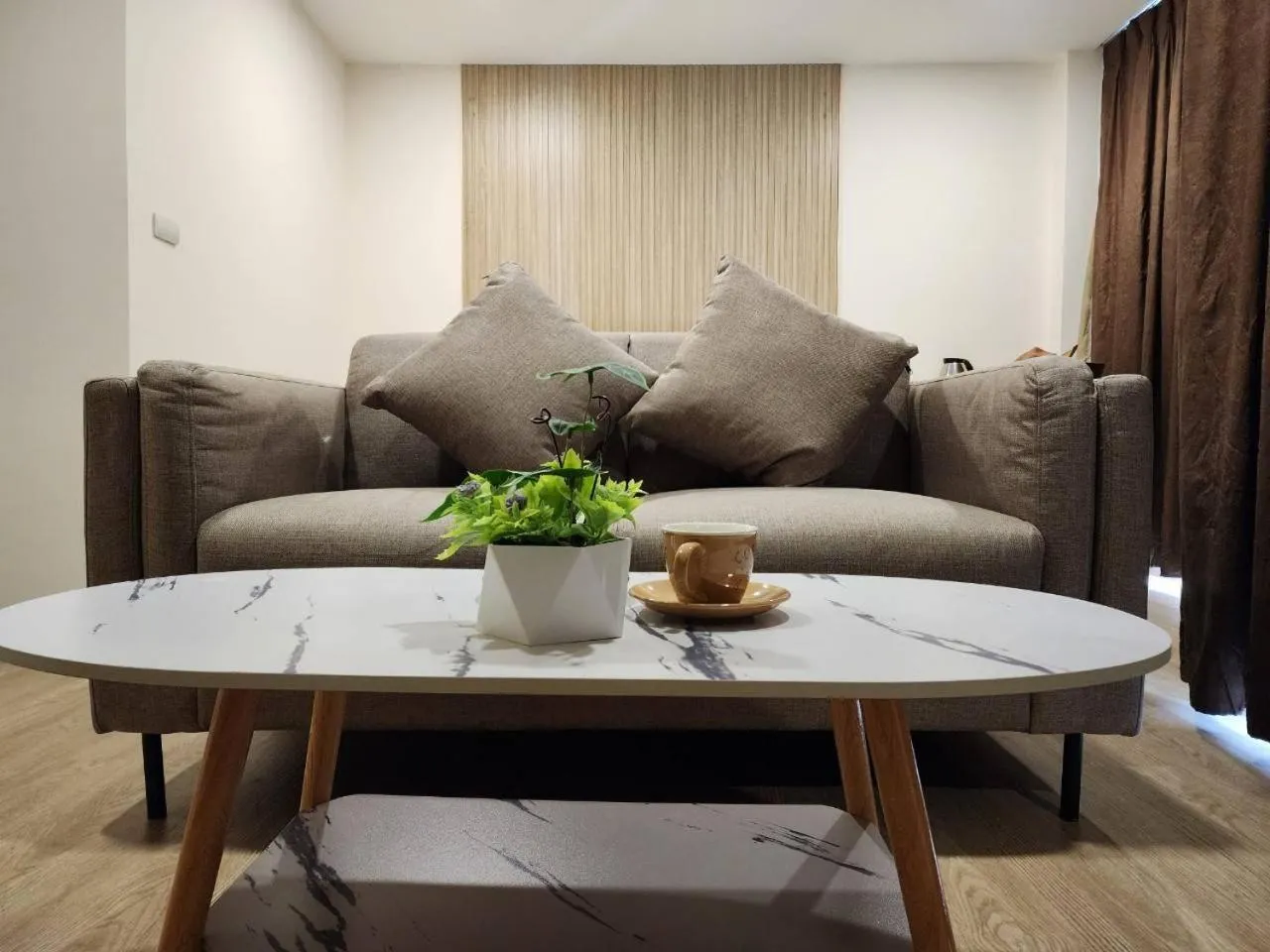 Seating area in iCheck inn Darisa Patong