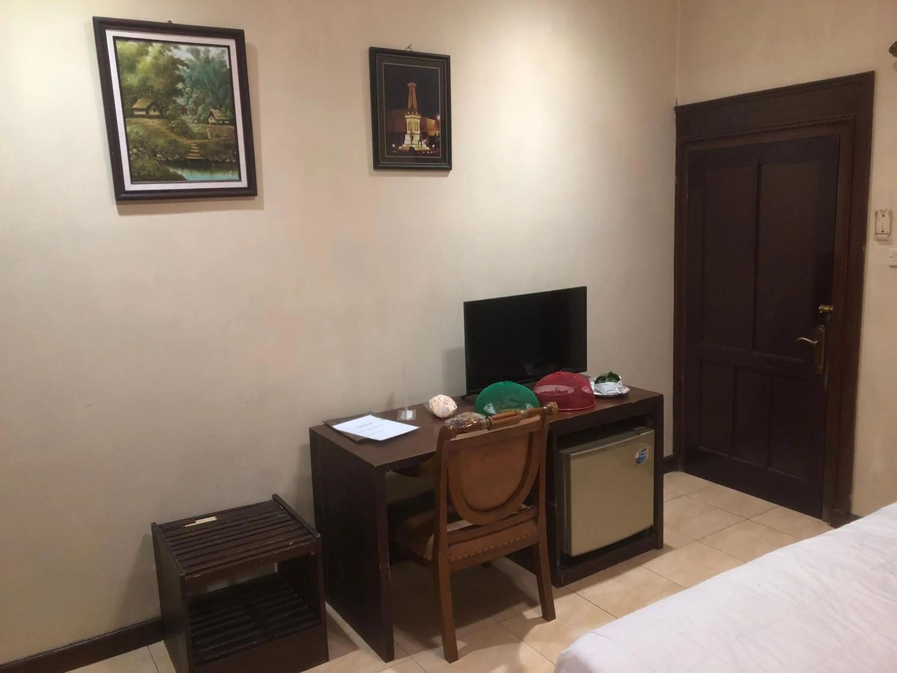 Bed in Ndalem Maharani Guest House