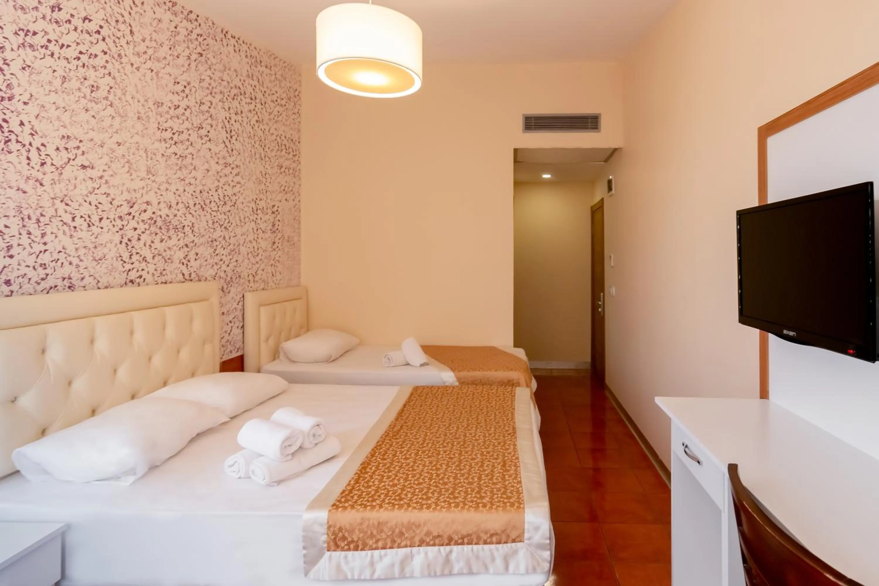 Bed in The Center Hotel