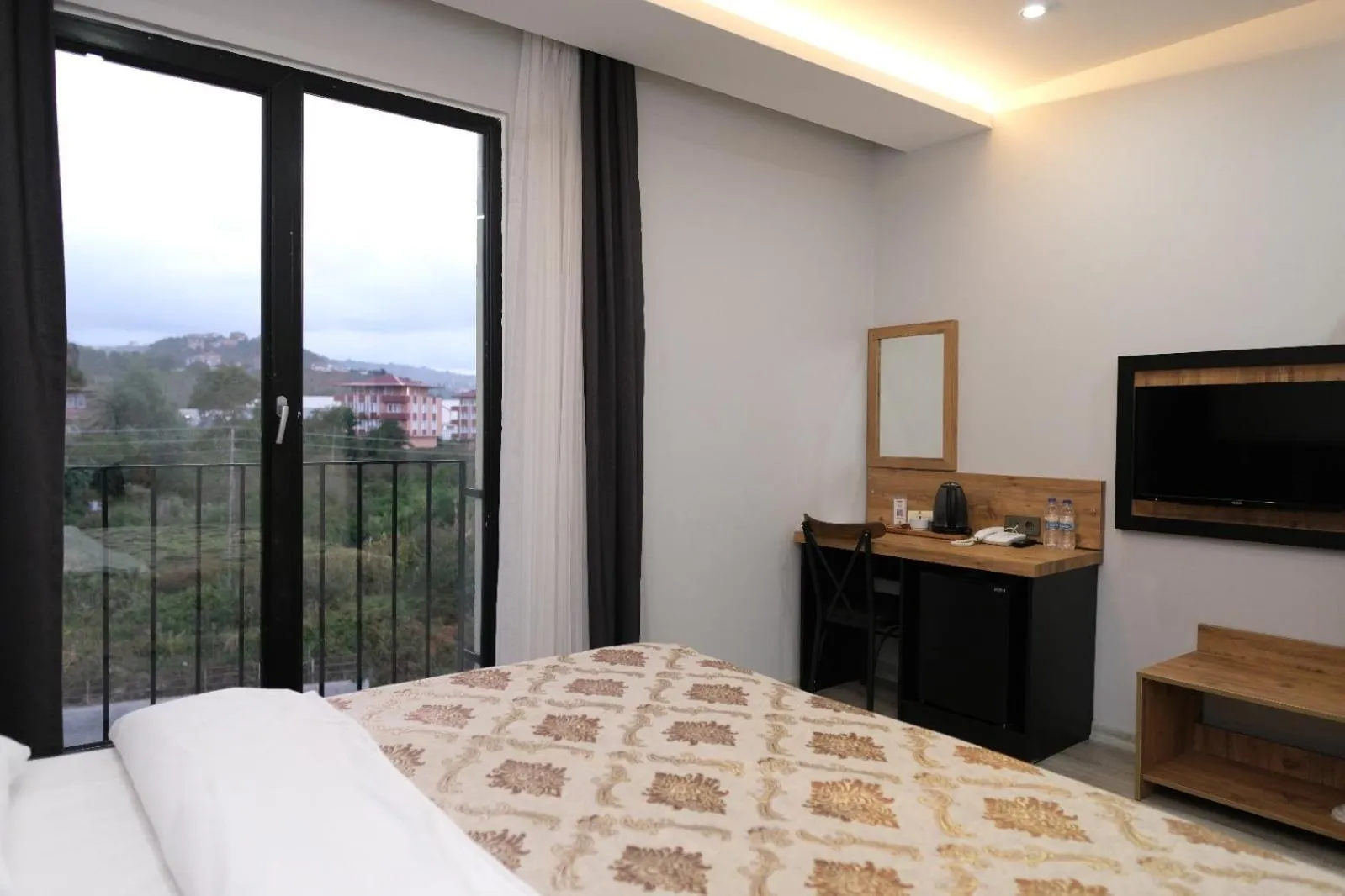 Bed in The Marine Hotel