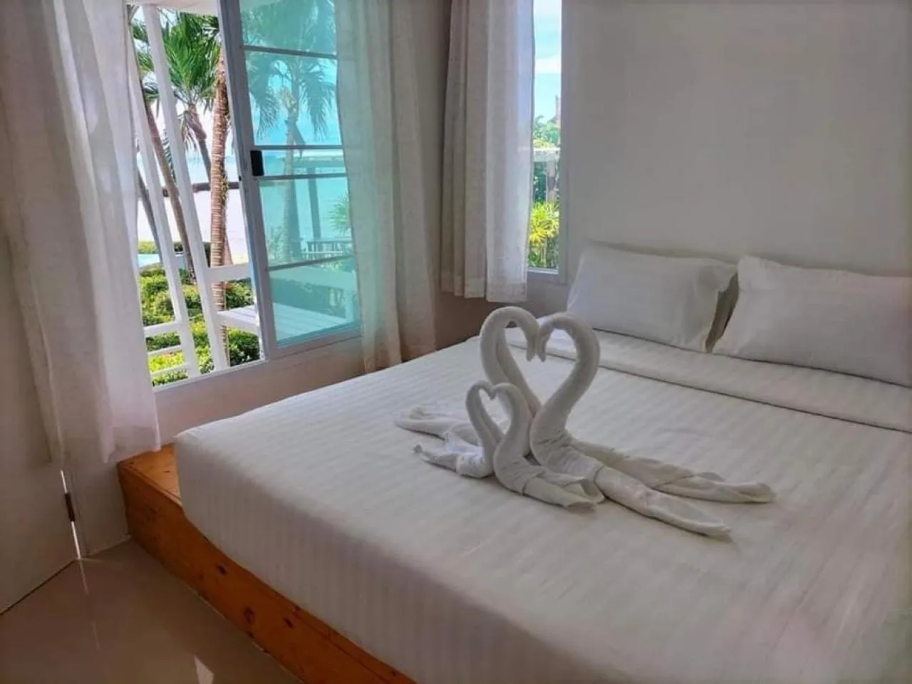 Photo of the whole room, Bed in White house bailan resort