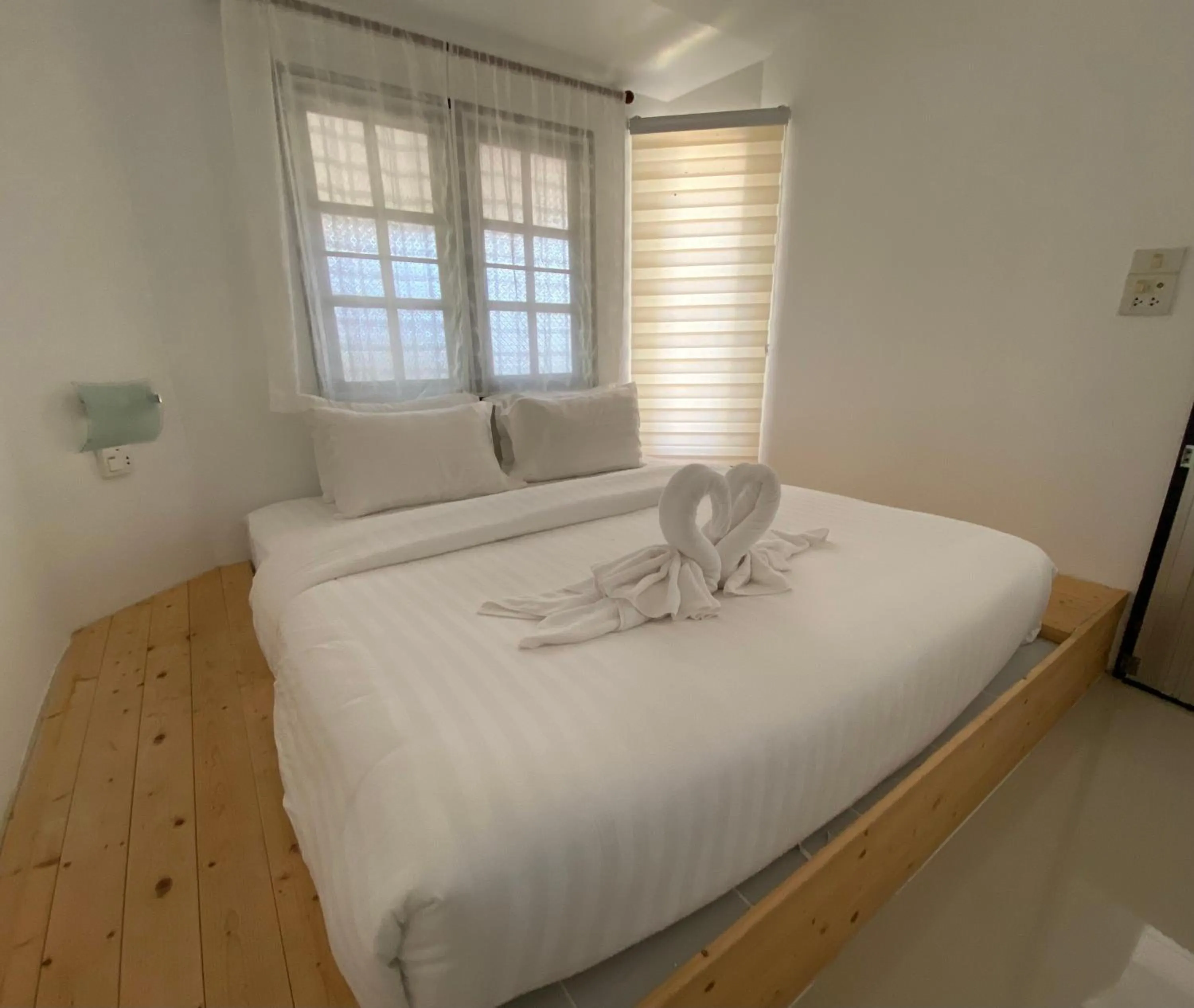 Bed in White house bailan resort