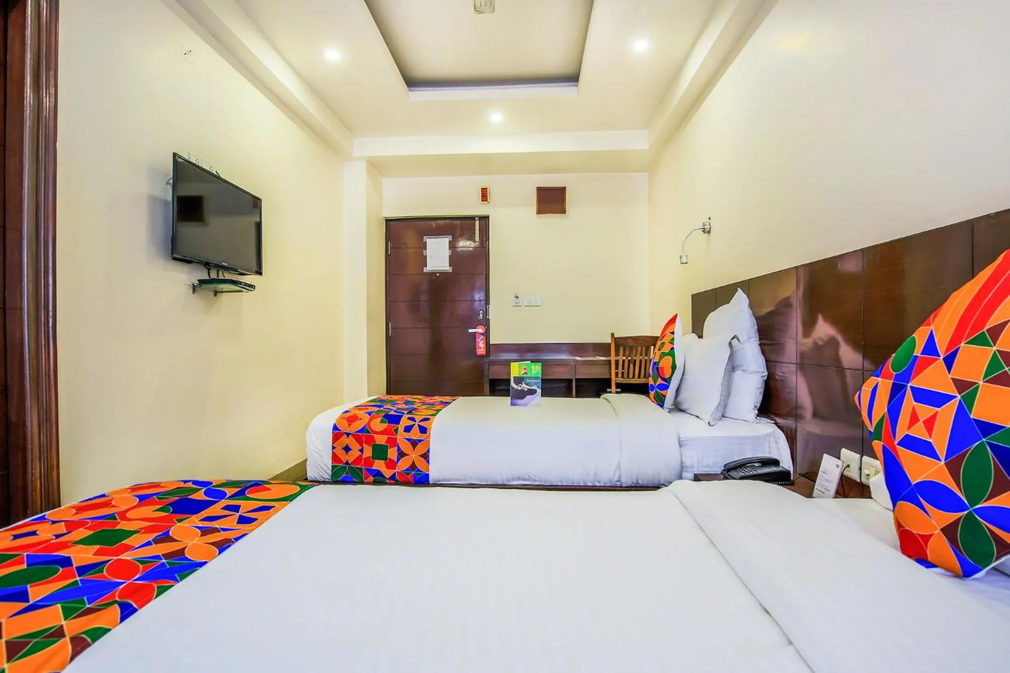 Bed in FabHotel Tipsyy Inn Suites