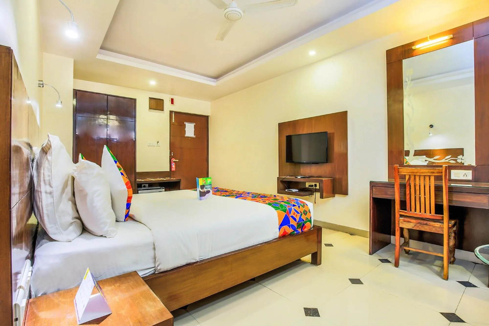 Bed in FabHotel Tipsyy Inn Suites