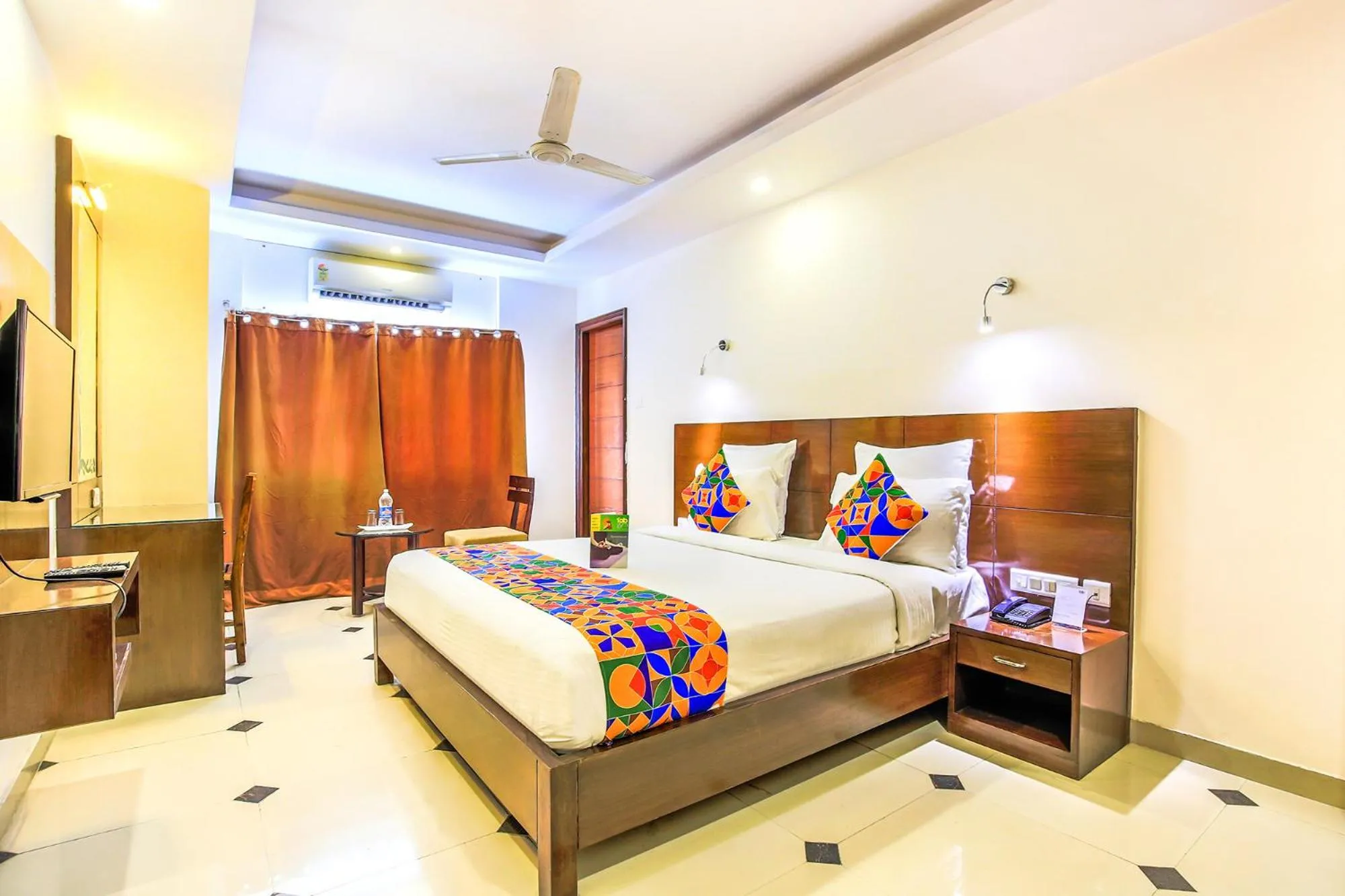 Bed in FabHotel Tipsyy Inn Suites