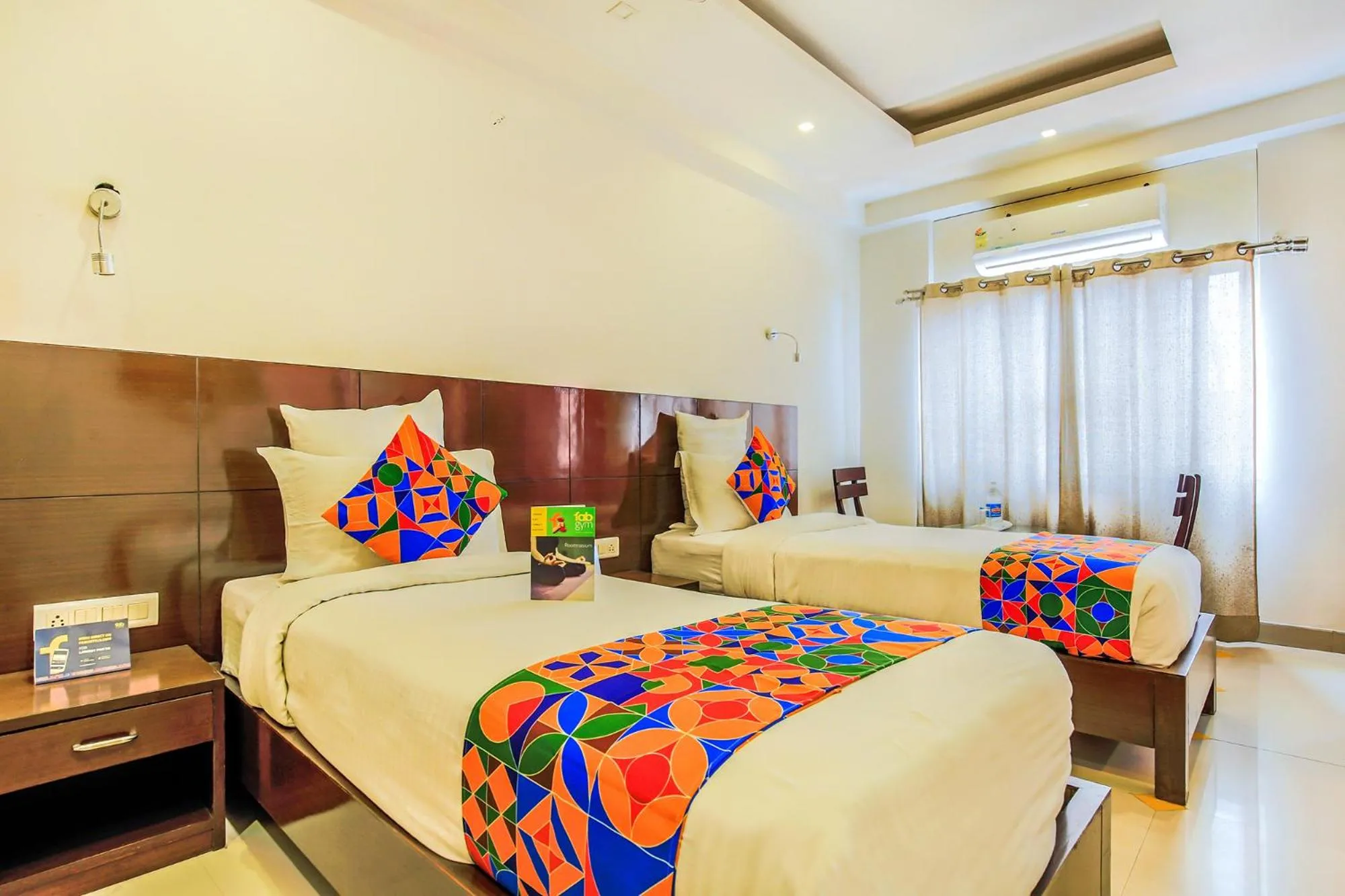 Bed in FabHotel Tipsyy Inn Suites