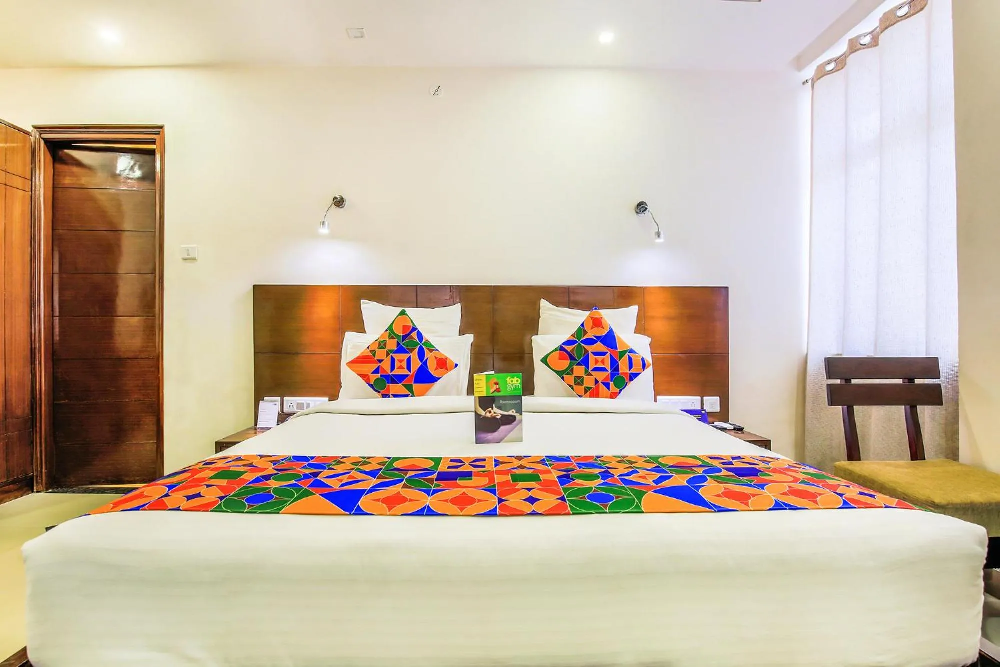 Bed in FabHotel Tipsyy Inn Suites