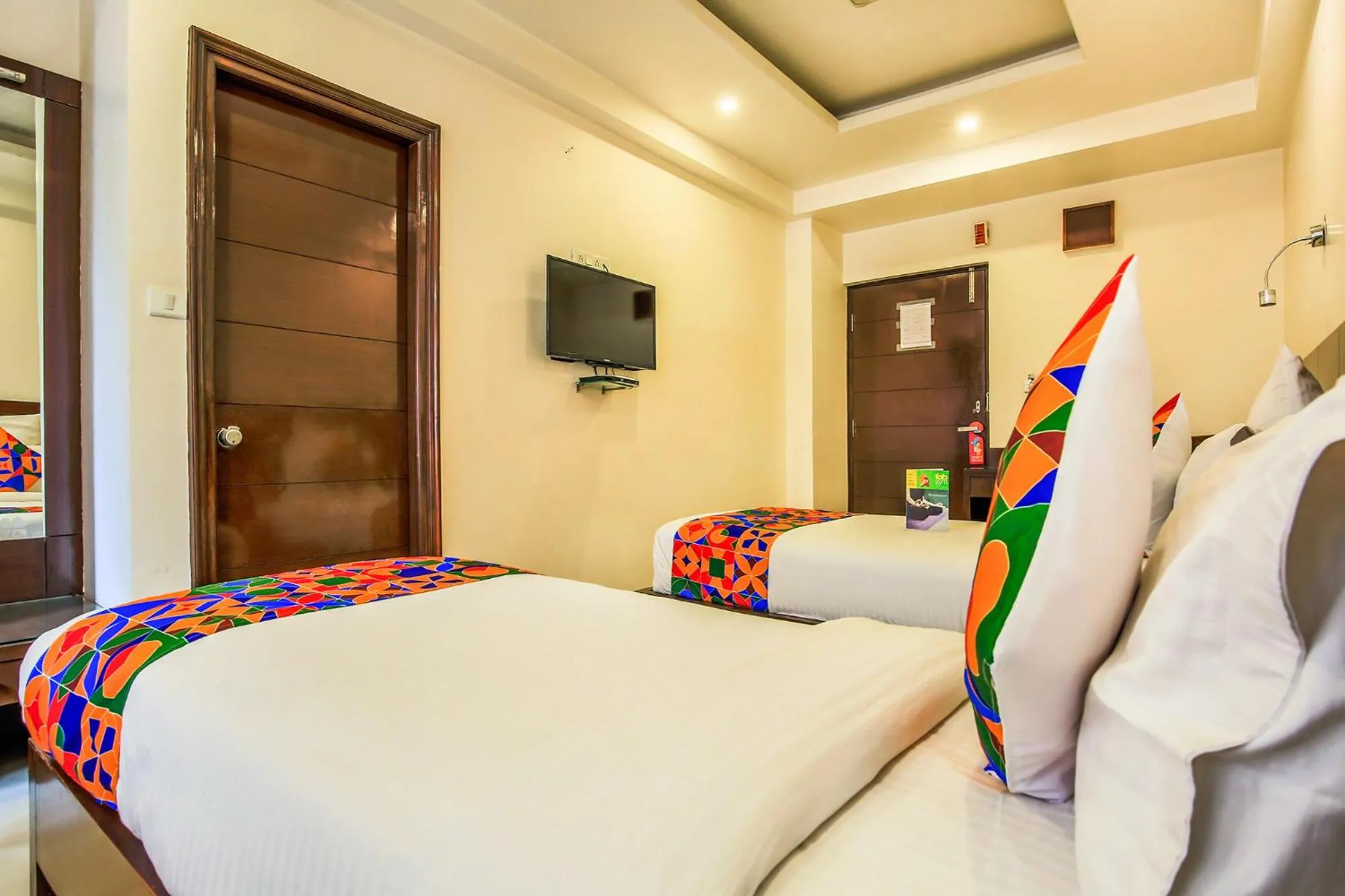 Bed in FabHotel Tipsyy Inn Suites