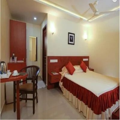 Bed in Hotel Sasthapuri