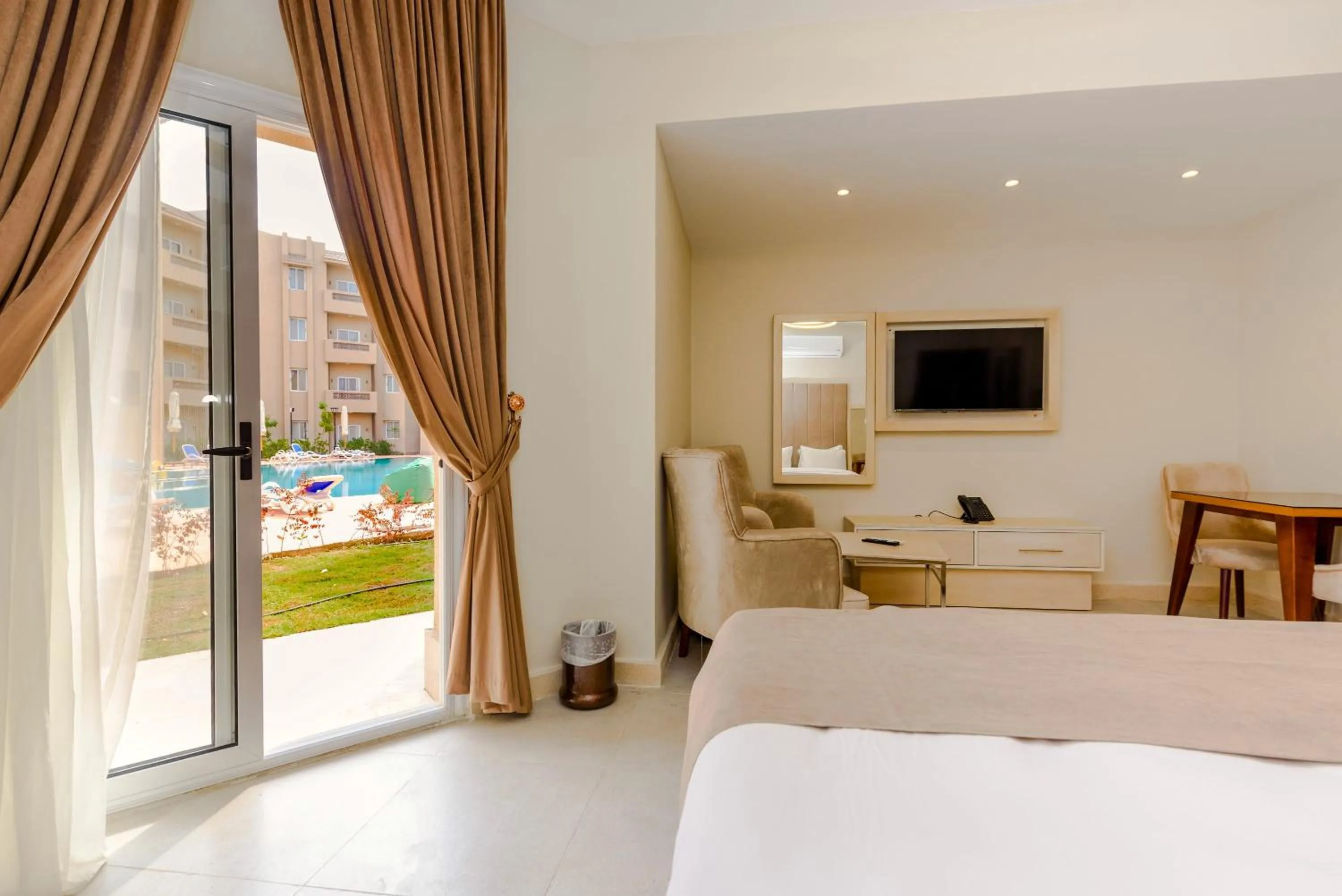 Patio, Bed in Marom Port Said Resort & Beach