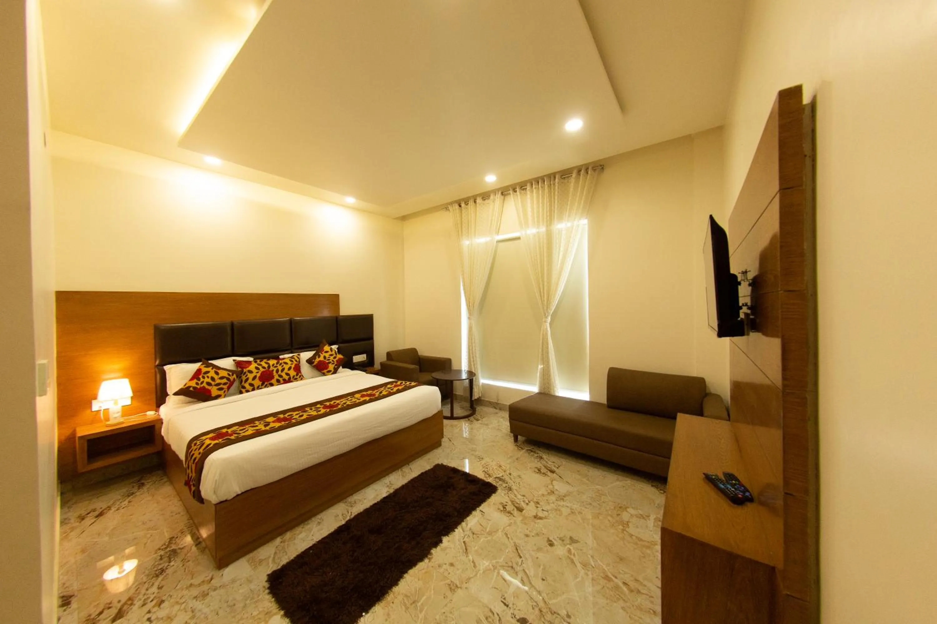 Photo of the whole room in Comfort Hotel Amritsar by Choice Hotels