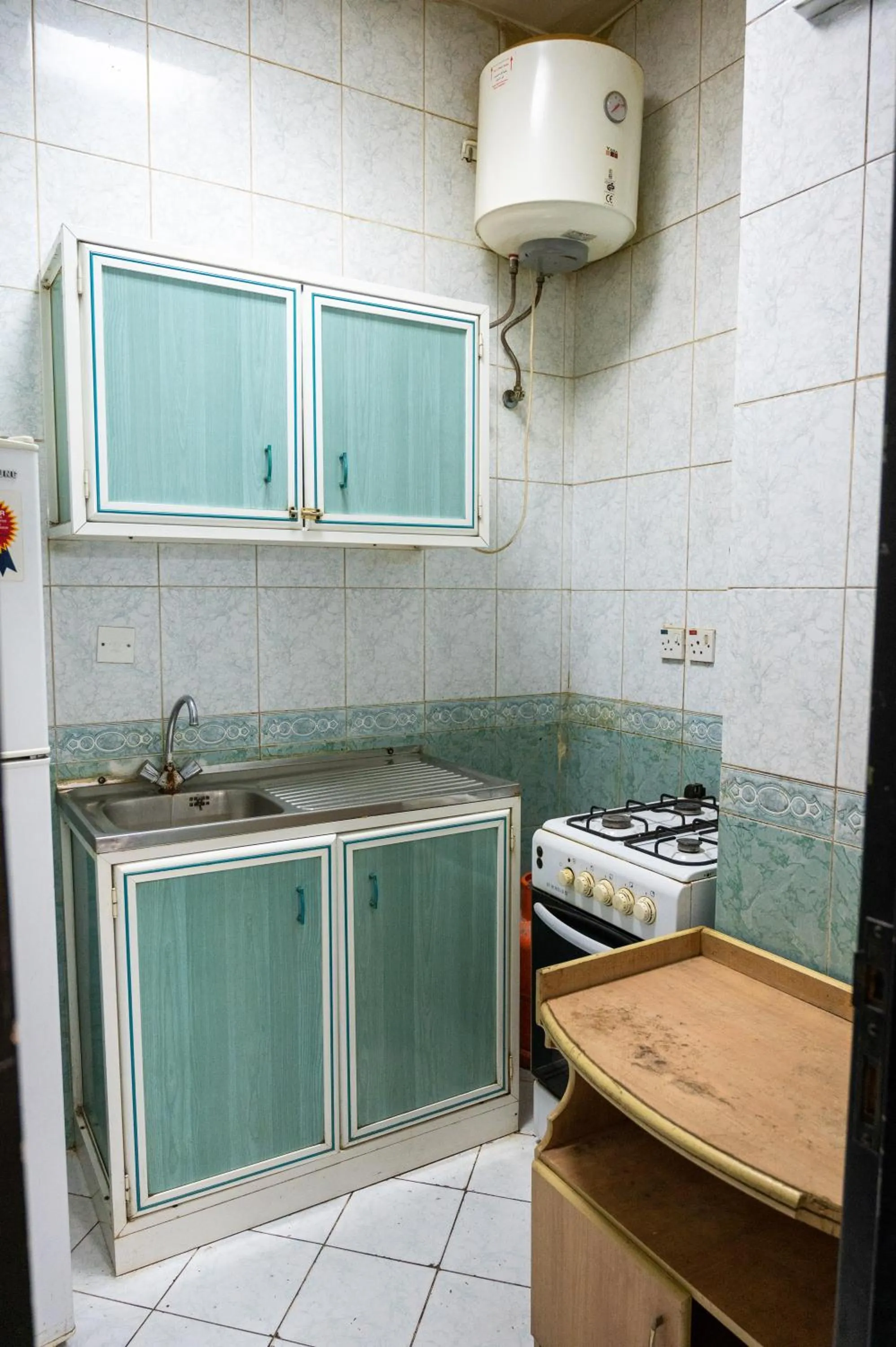 Kitchen or kitchenette in Qaser Alhamra Serviced apartments