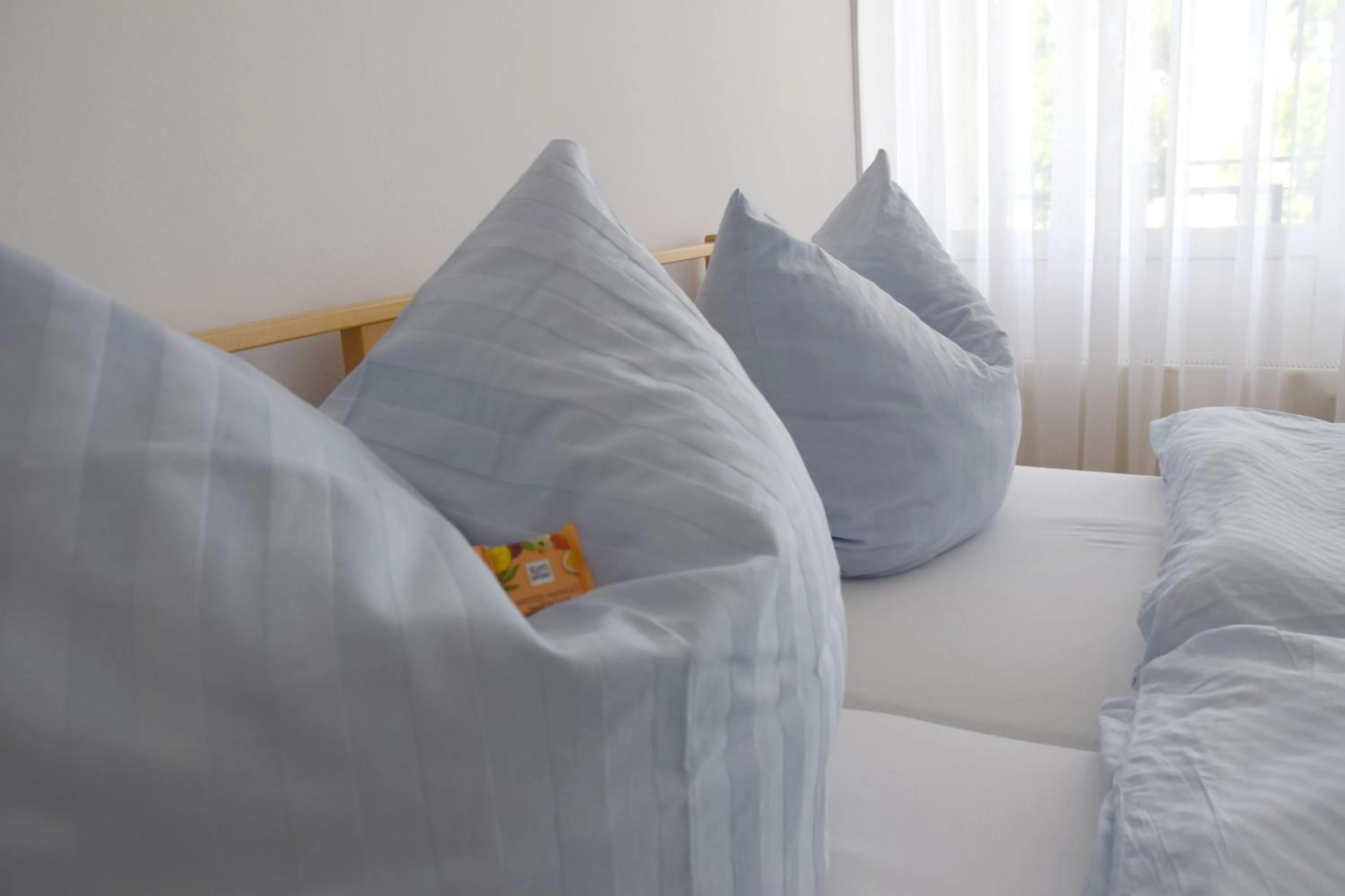 Bed in Hotel im Homburger Ländchen