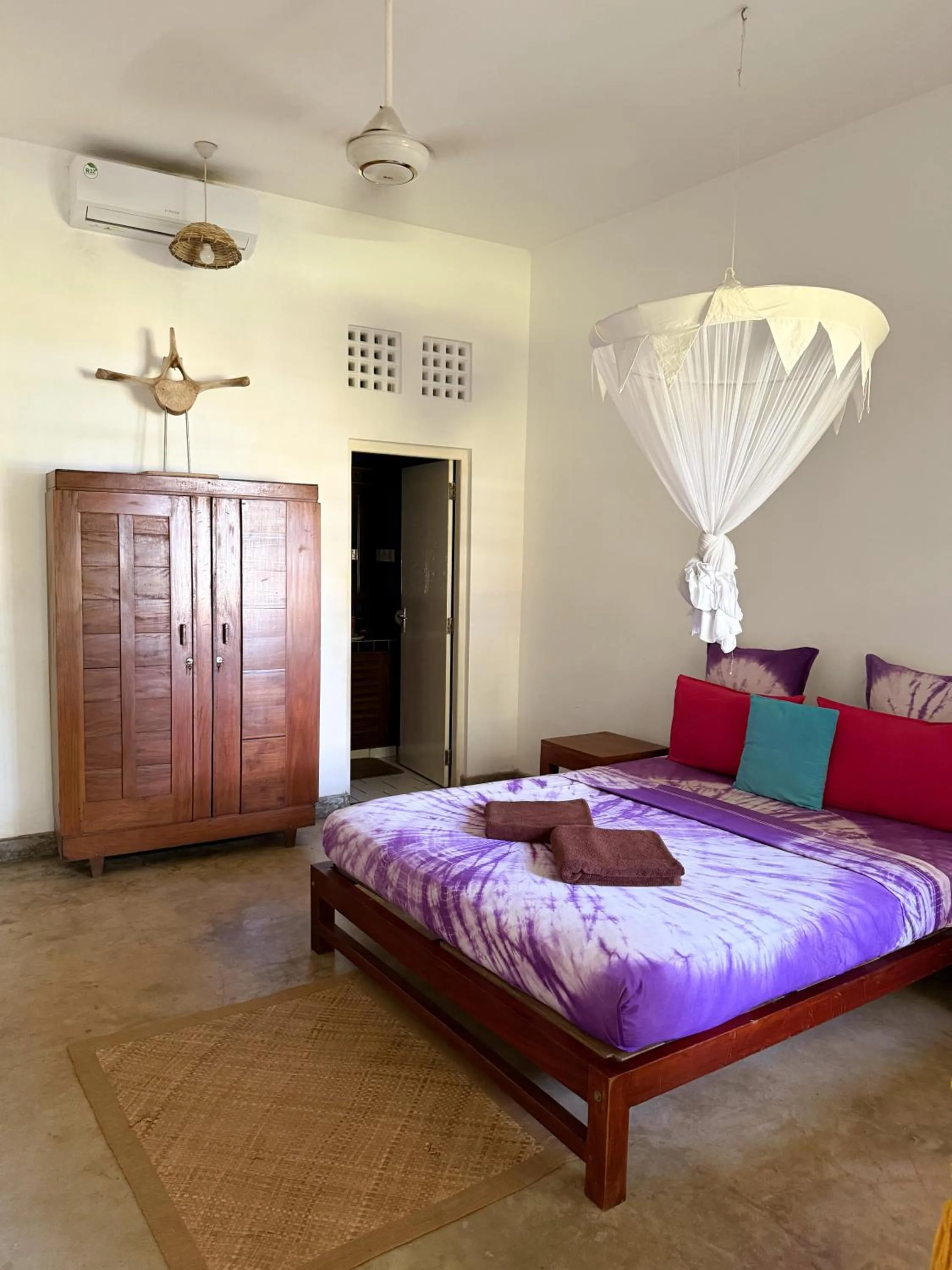 Bed in Palm villa Mirissa hotel&spa
